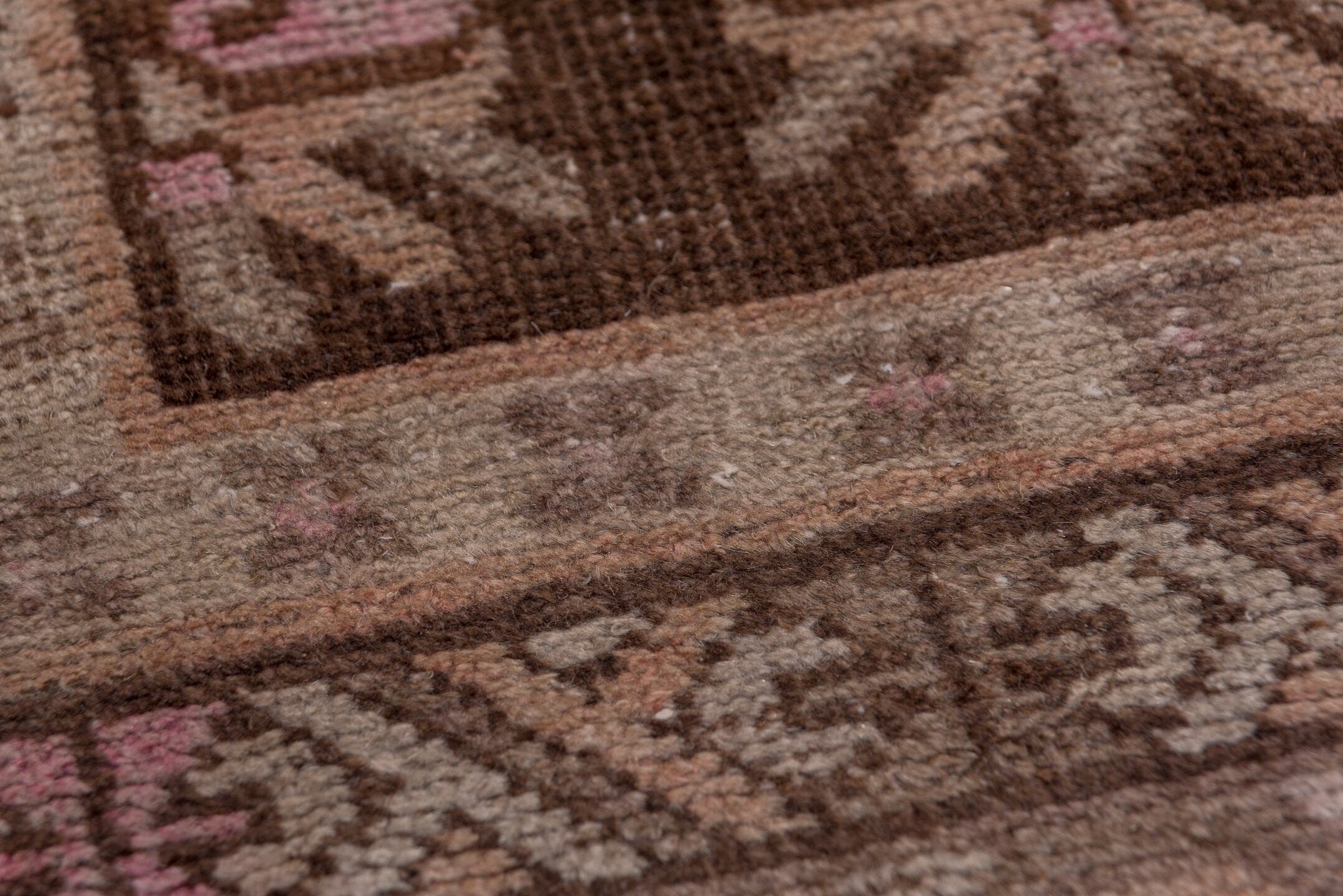 4' x 9' one-of-a-kind handmade vintage Khotan rug. Color palette: brown, rose, taupe, ivory, dusty pink, charcoal, camel