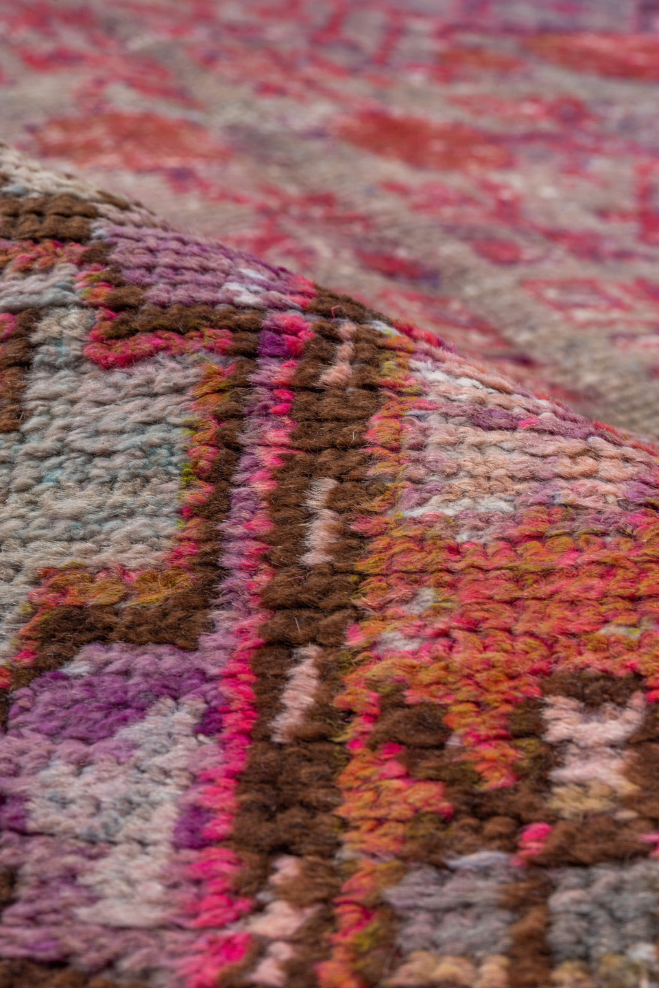 5' x 9' one-of-a-kind handmade vintage Khotan medium size rug. Color palette: brown, pink, red, rosy brown