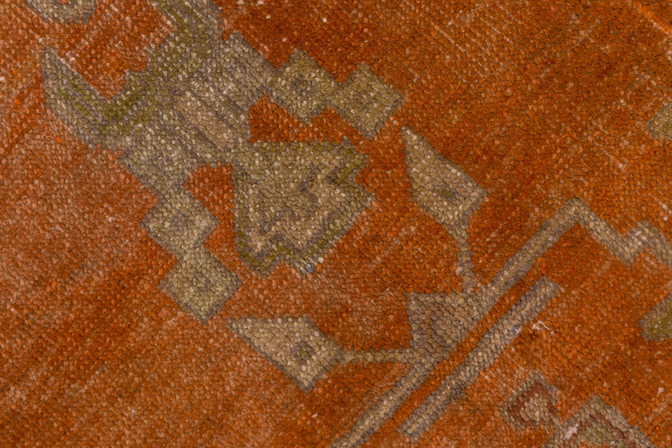 5' x 9' one-of-a-kind handmade antique Khotan medium size rug. Color palette: terra cotta, taupe, rust, camel, ivory, sienna