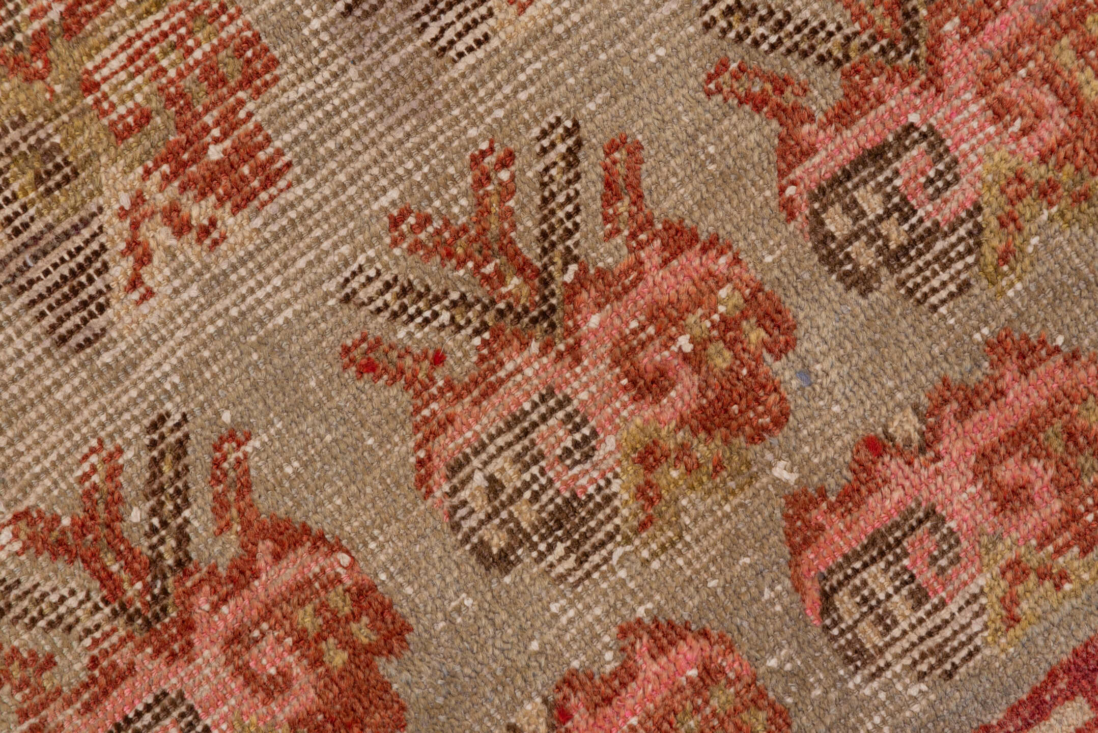 4' x 7' one-of-a-kind handmade vintage Khotan rug. Color palette: brown, off-white, orange, pink