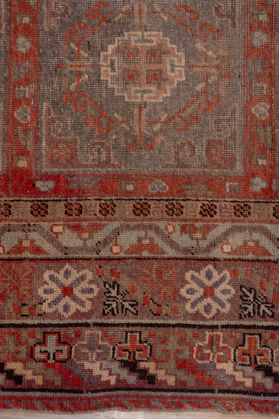 6' x 12' one-of-a-kind handmade vintage Khotan large size rug. Color palette: brown, gray, pink, red