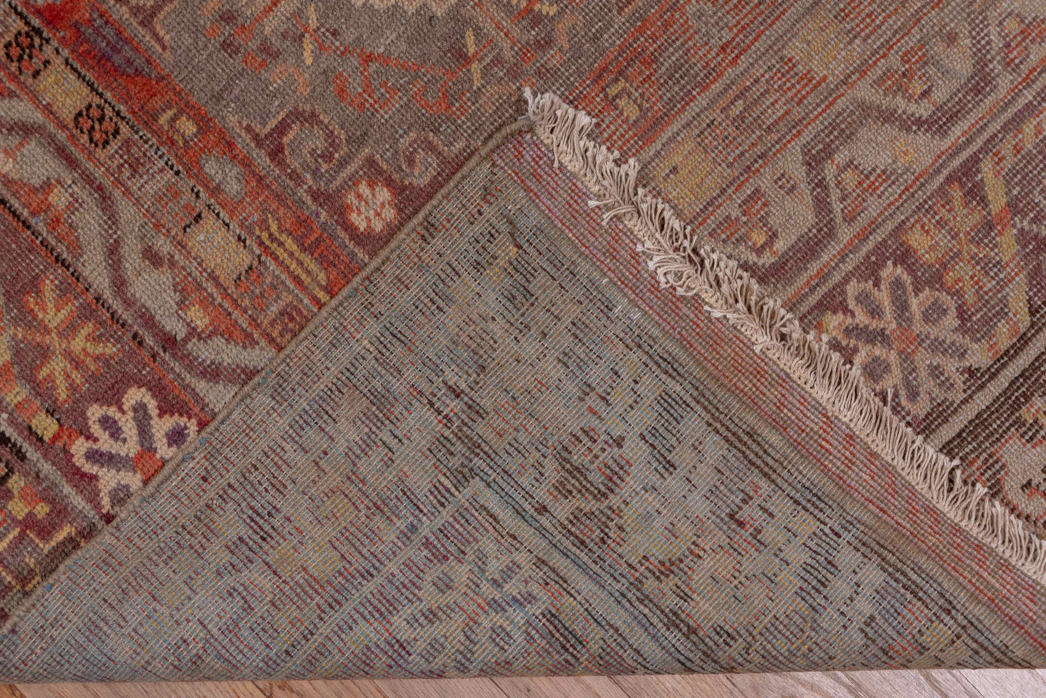 6' x 12' one-of-a-kind handmade vintage Khotan large size rug. Color palette: brown, gray, pink, red