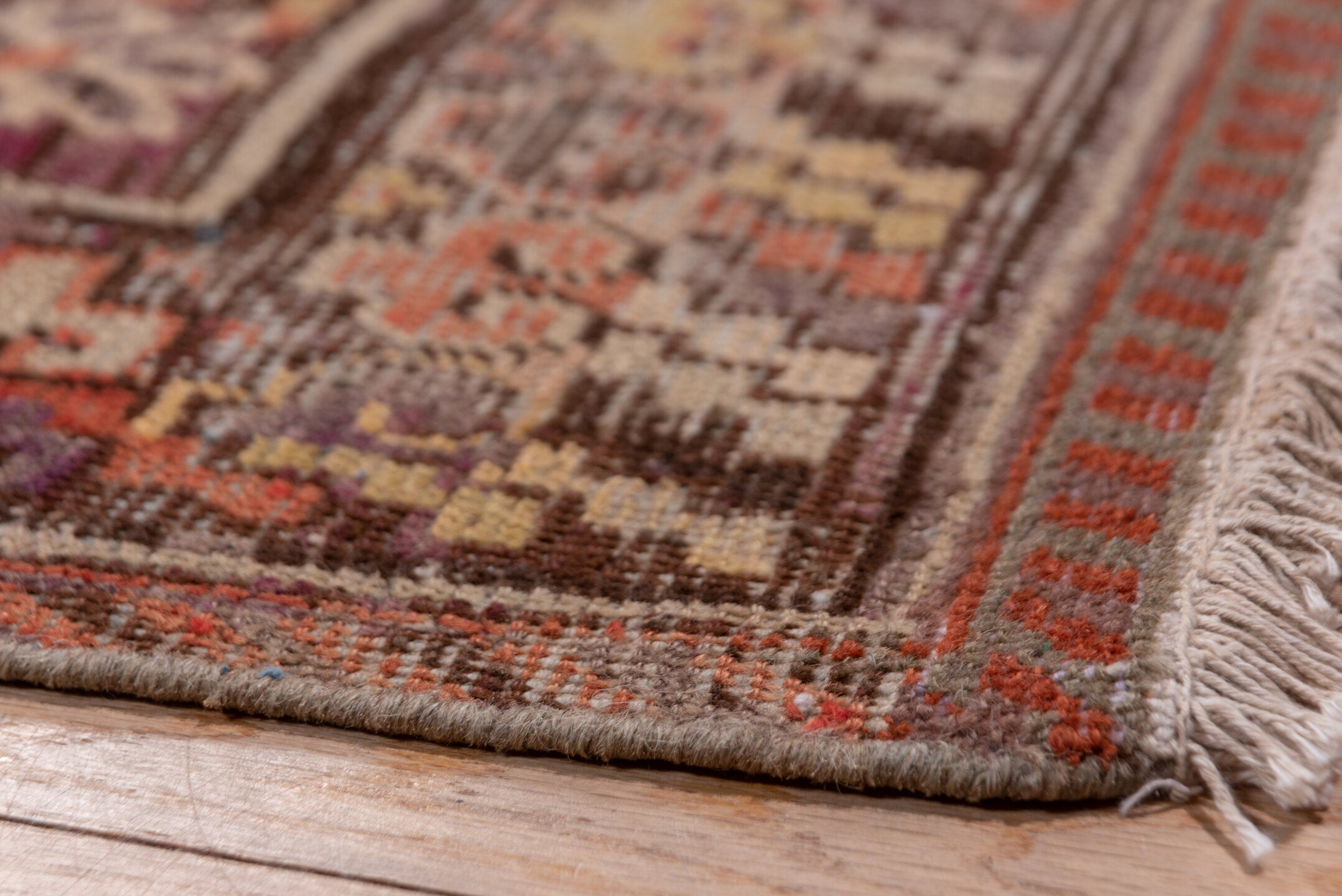 6' x 12' one-of-a-kind handmade vintage Khotan large size rug. Color palette: brown, gray, pink, red