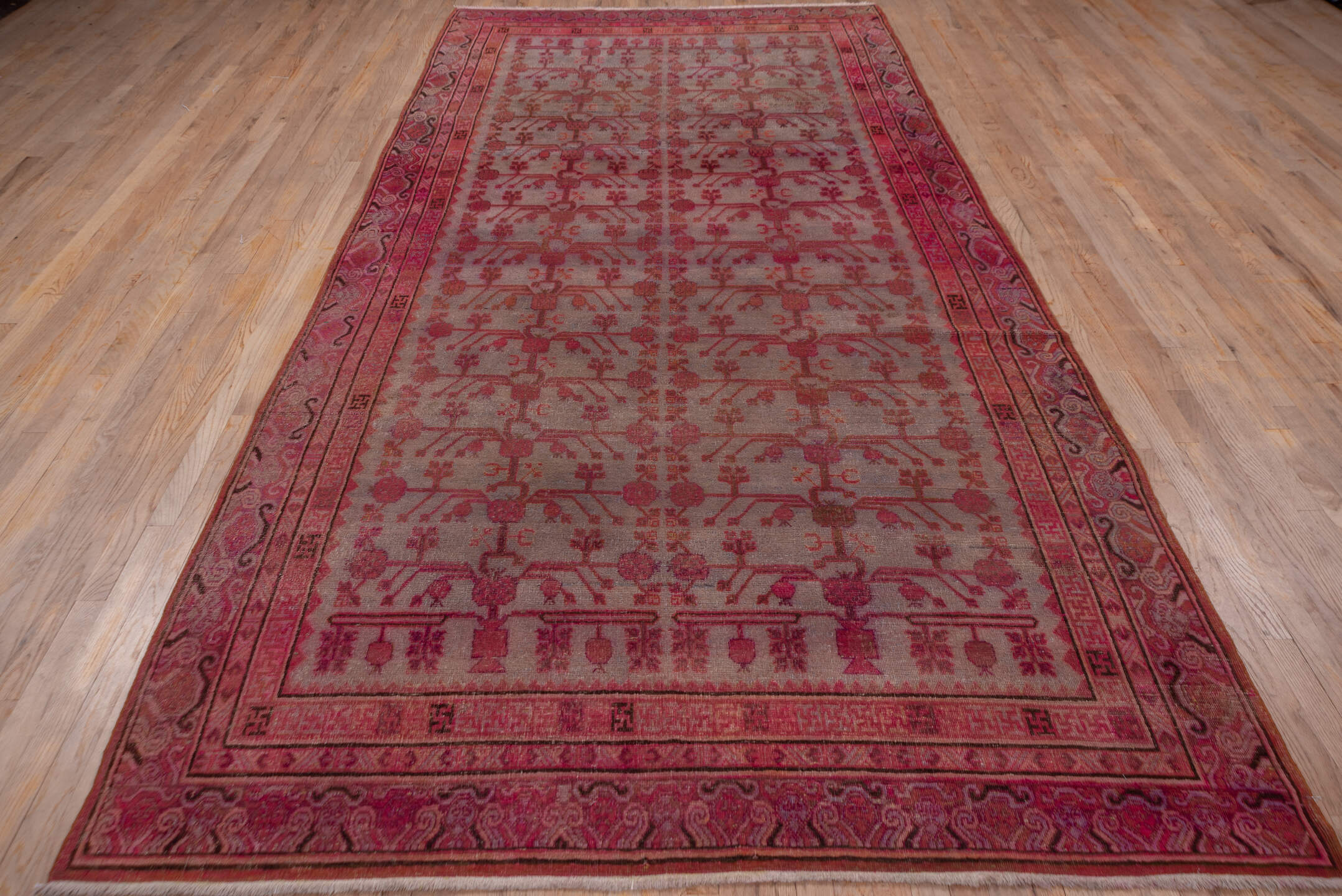 6' x 13' one-of-a-kind handmade antique Khotan large size rug. Color palette: rose, dusty mauve, terra cotta, crimson, taupe