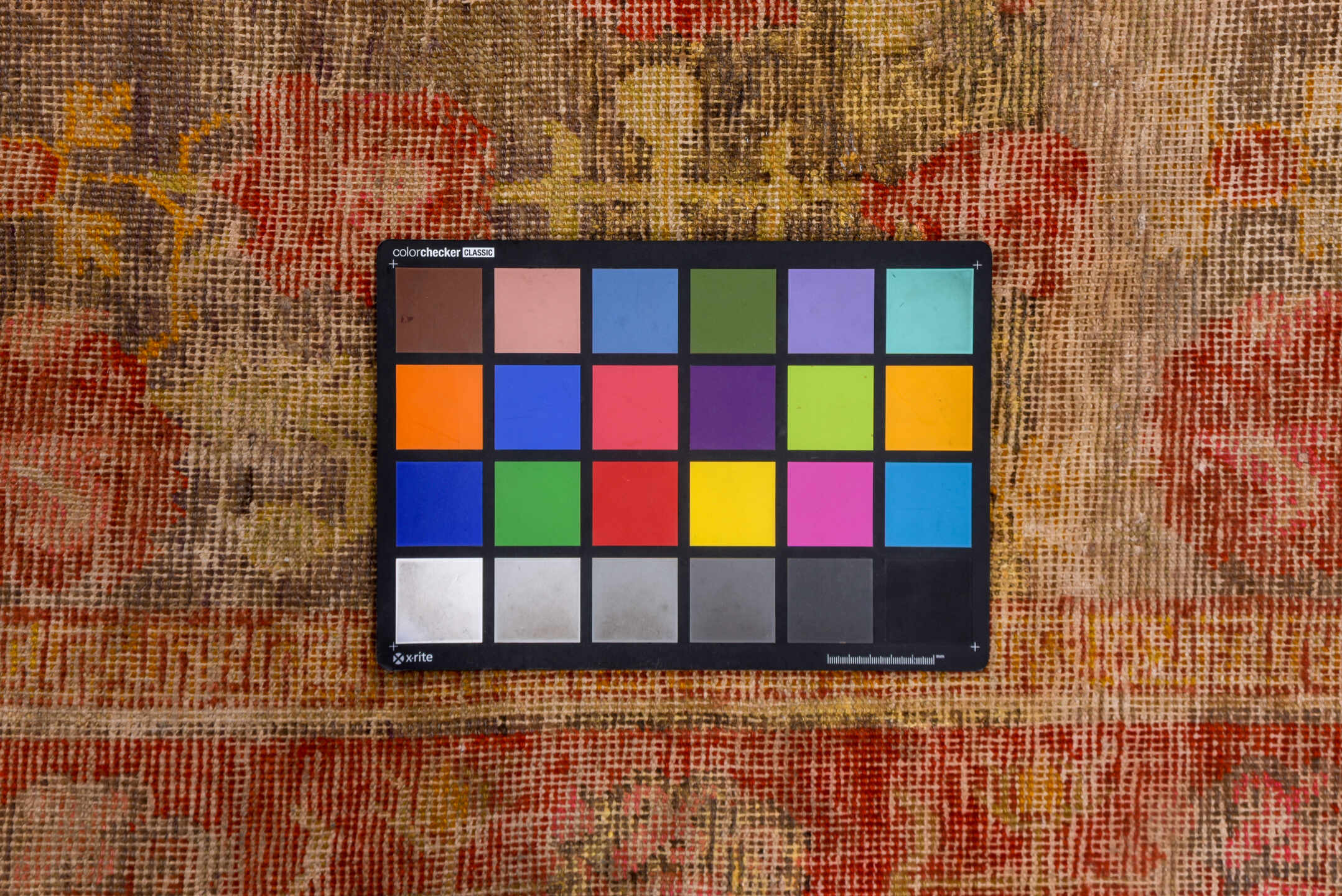 6' x 12' one-of-a-kind handmade vintage Khotan large size rug. Color palette: brown, gray, pink, red