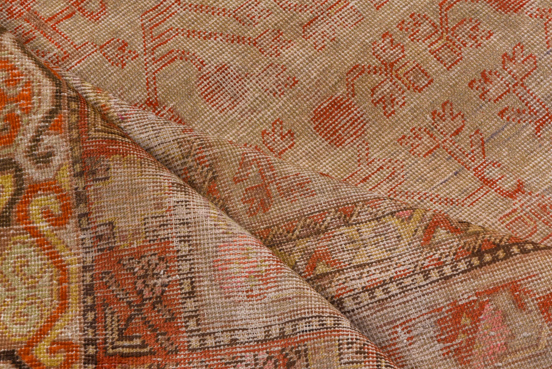 8' x 15' one-of-a-kind handmade antique Khotan rug. Color palette: blush, ivory, rust, taupe, camel, rose, sienna, pink