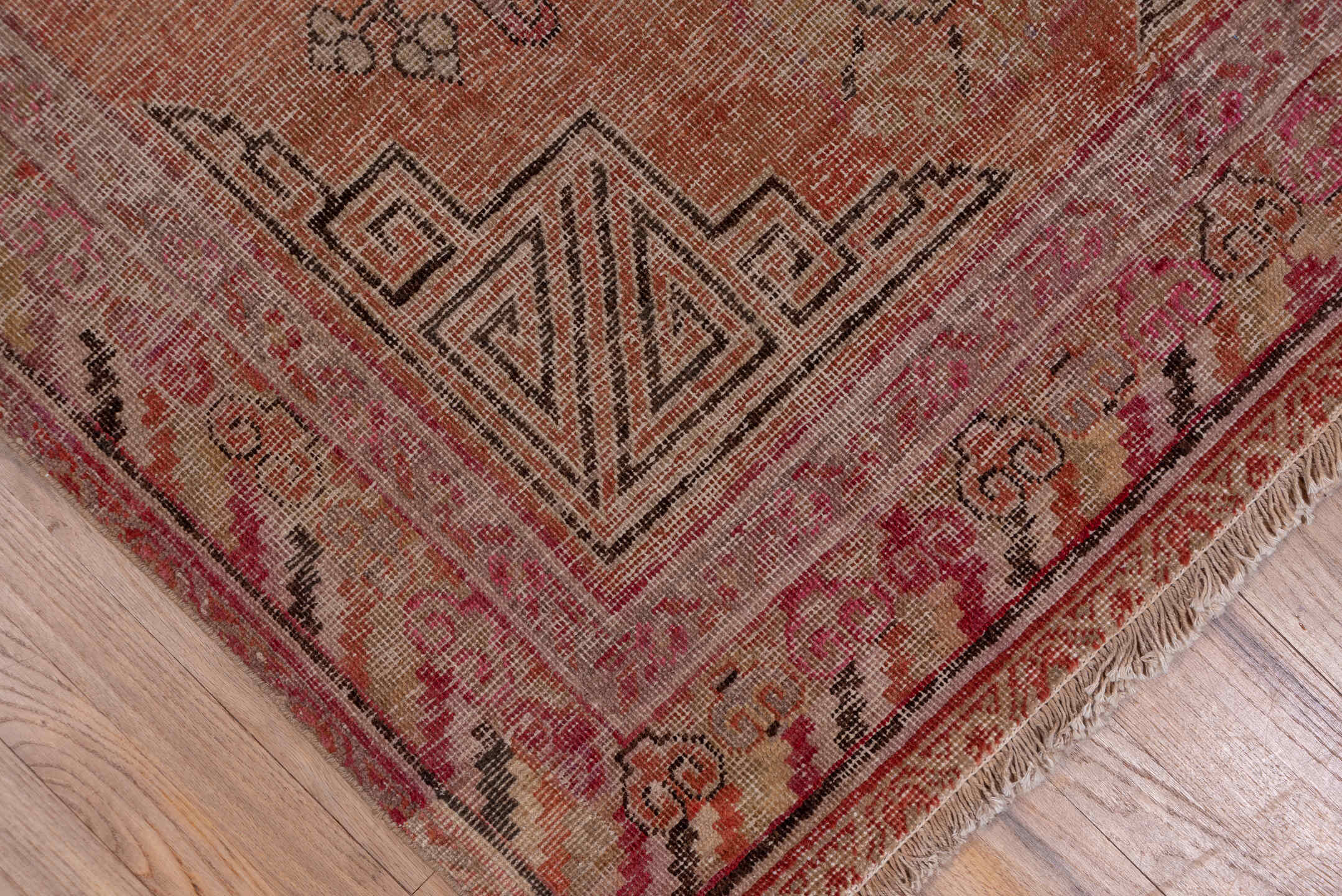 4' x 9' one-of-a-kind handmade vintage Khotan runner rug. Color palette: brown, gray, pink, red