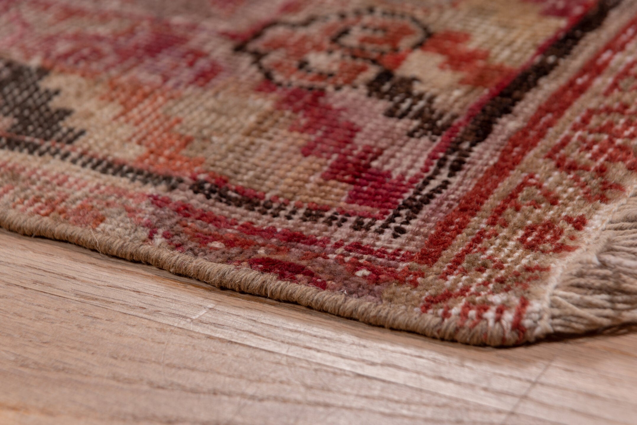 4' x 9' one-of-a-kind handmade vintage Khotan runner rug. Color palette: brown, gray, pink, red