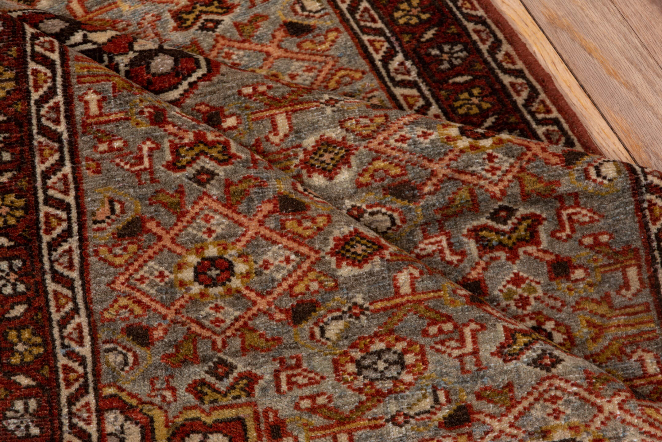 2' x 4' one-of-a-kind handmade antique Malayer small size rug. Color palette: rust, blue-gray, ivory, gold, brown, camel