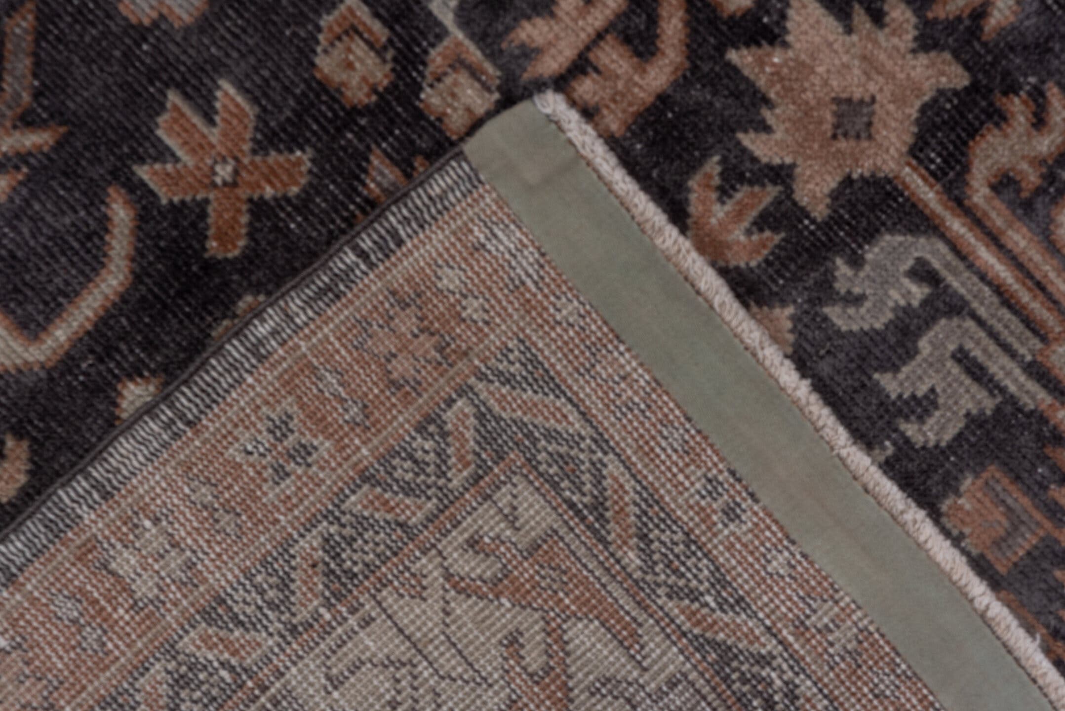 5' x 12' one-of-a-kind handmade antique Sparta rug. Color palette: charcoal, rust, ivory, taupe, slate, brown, gray, black