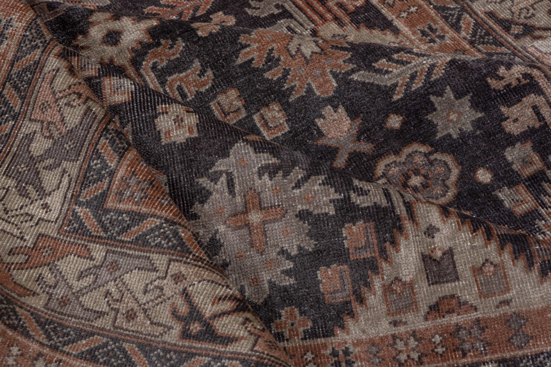 5' x 12' one-of-a-kind handmade antique Sparta rug. Color palette: charcoal, rust, ivory, taupe, slate, brown, gray, black