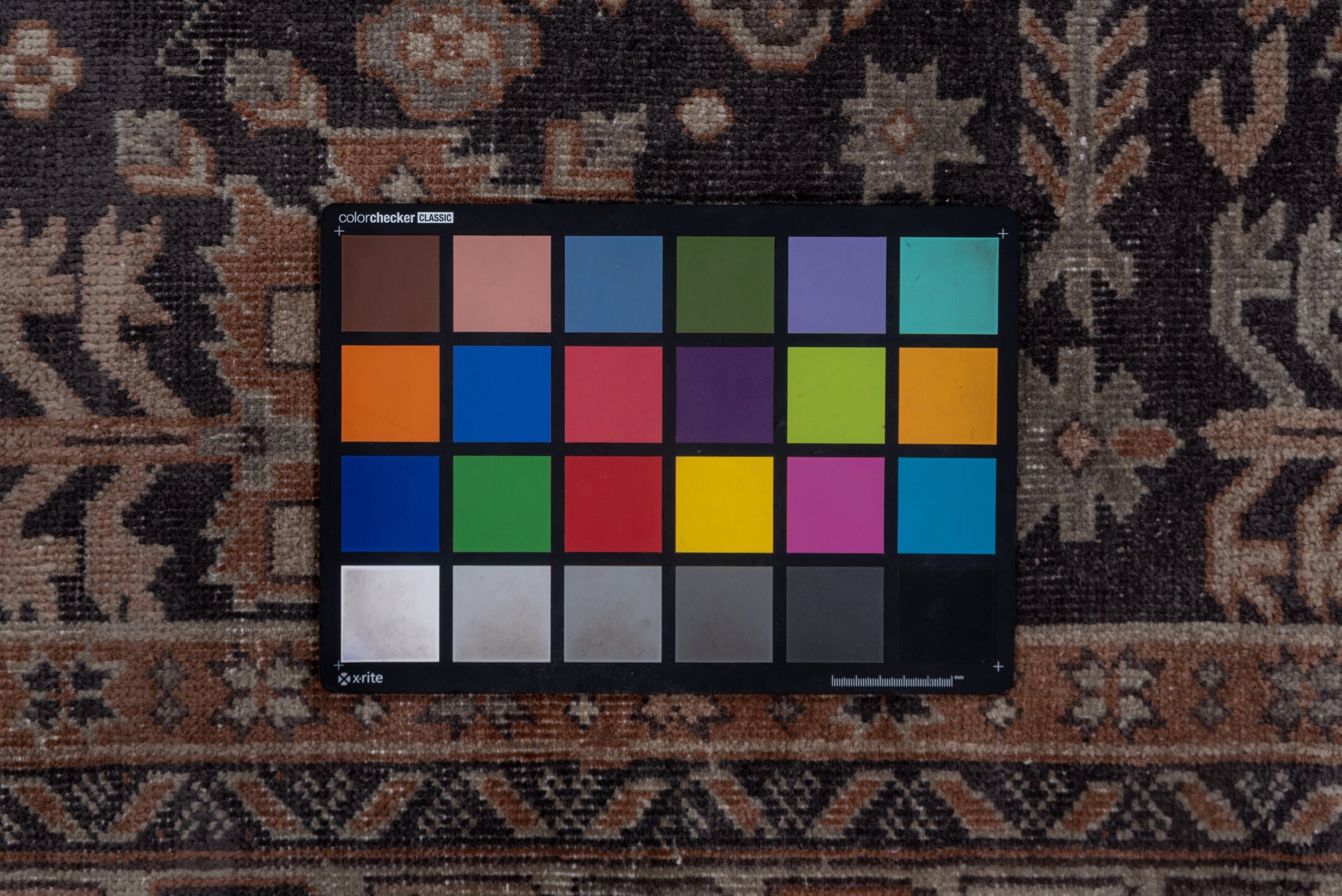 5' x 12' one-of-a-kind handmade vintage Sparta rug. Color palette: black, brown, charcoal, dim gray, gray, red, redwood