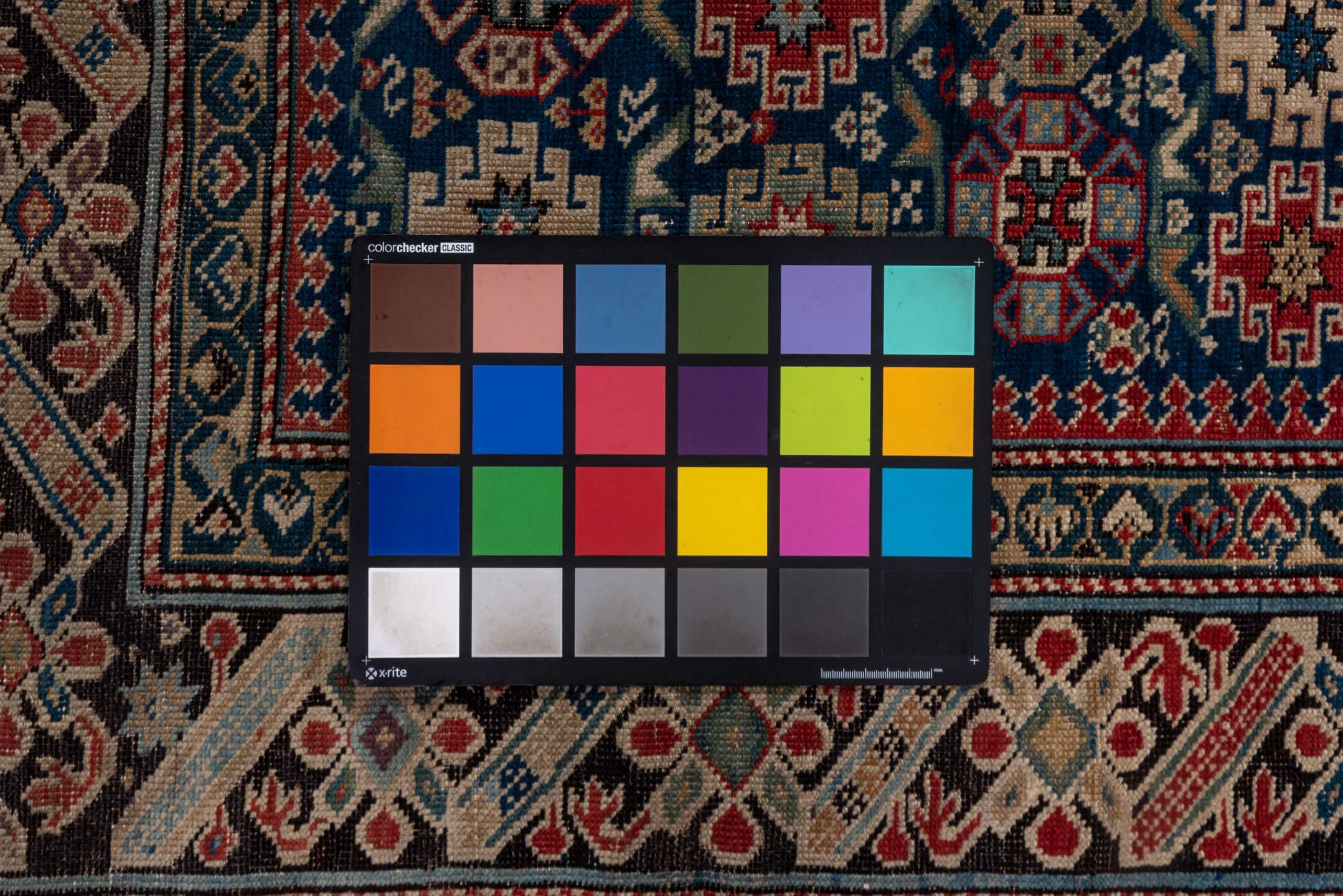 3' x 5' one-of-a-kind handmade antique Chichi small size rug. Color palette: navy, ivory, red, sky_blue, charcoal, camel