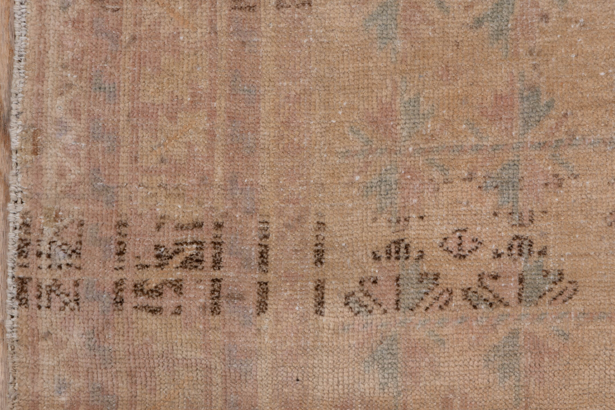 2' x 4' one-of-a-kind handmade vintage Anatolian small size rug. Color palette: brown, gray, light gray, off-white, pink