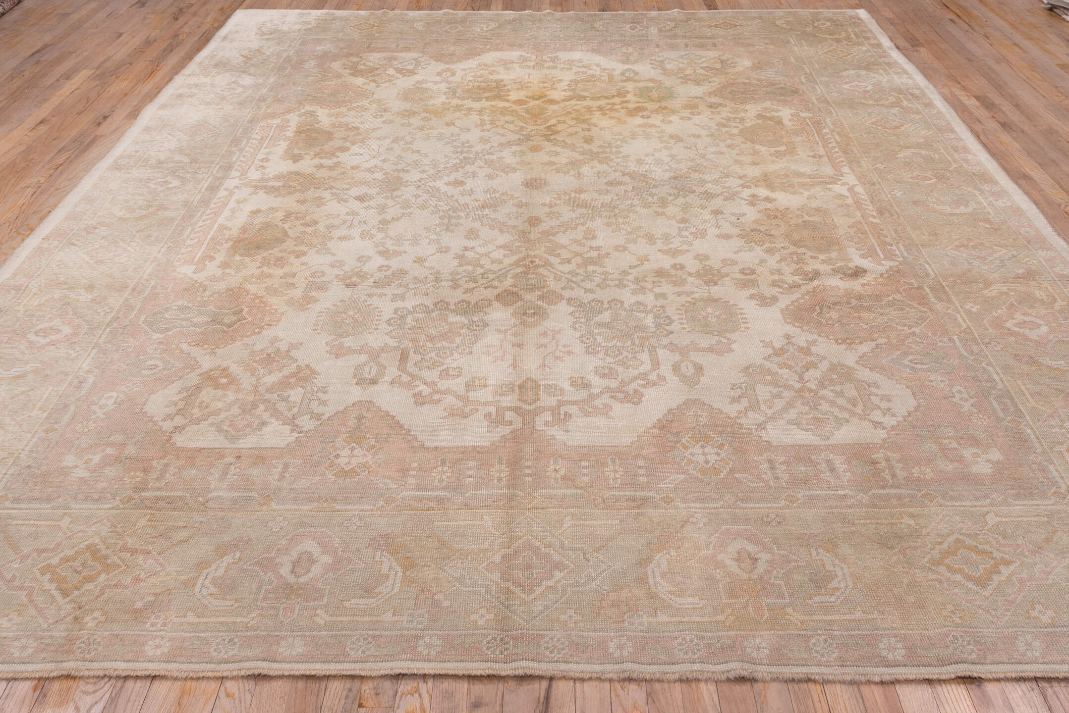 9' x 12' one-of-a-kind handmade antique Oushak large size rug. Color palette: ivory, blush, taupe, sage, peach, beige, pink