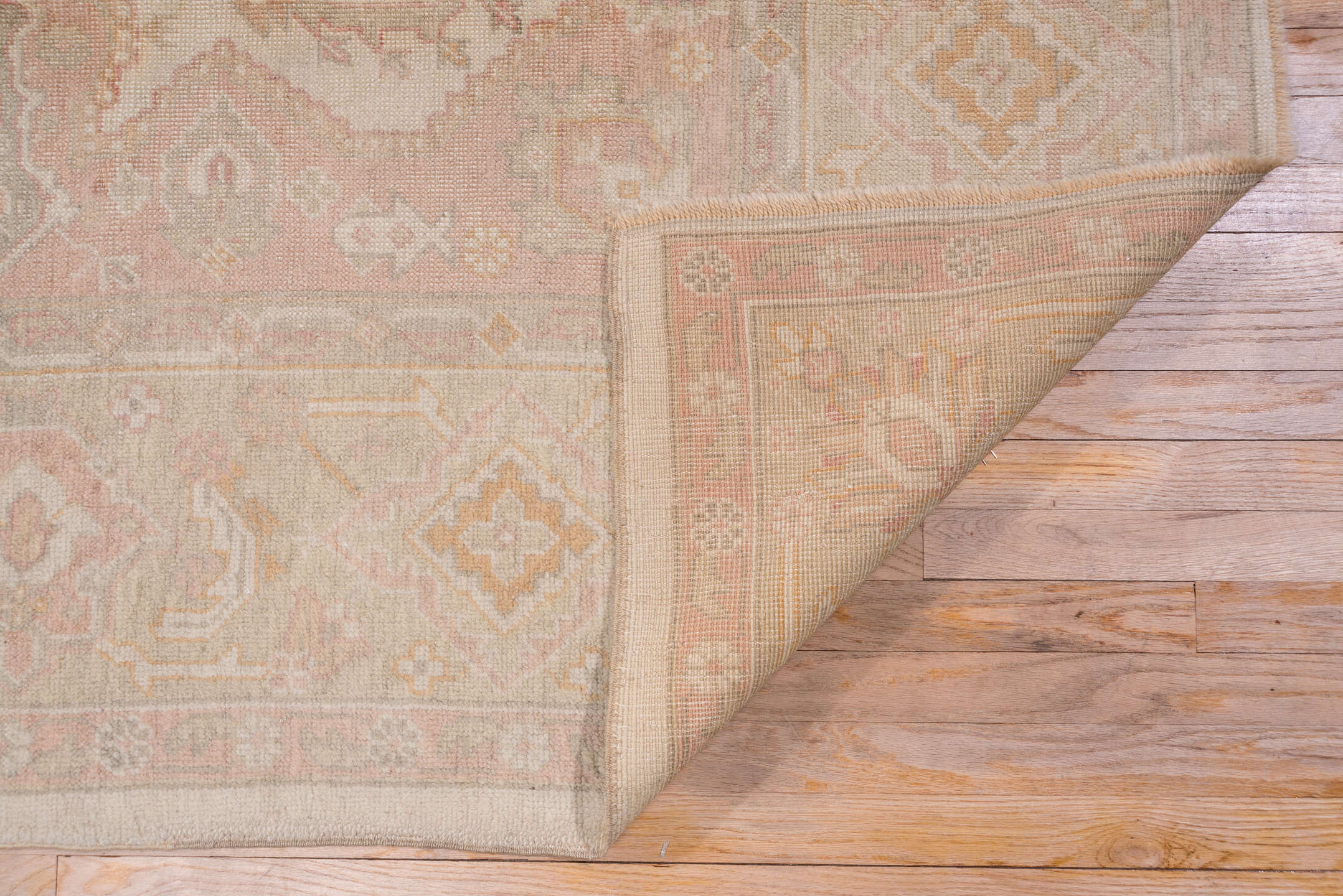 9' x 12' one-of-a-kind handmade antique Oushak large size rug. Color palette: ivory, blush, taupe, sage, peach, beige, pink