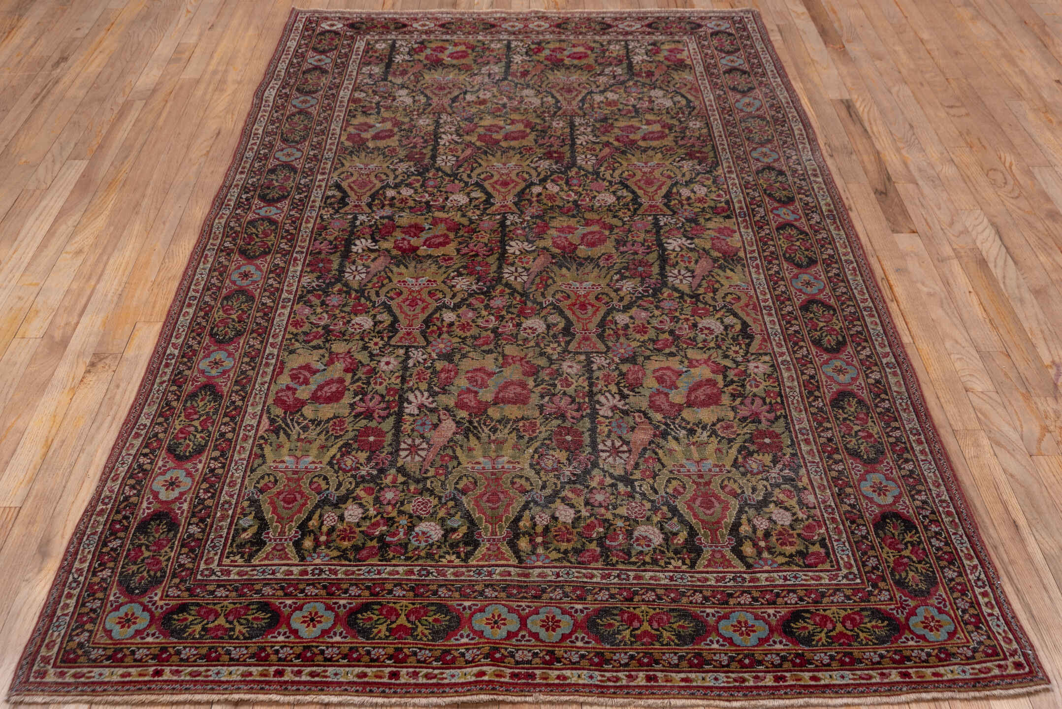 4' x 8' one-of-a-kind handmade antique Agra rug. Color palette: olive, rust, rose, ivory, burgundy, gold, sky_blue, brown
