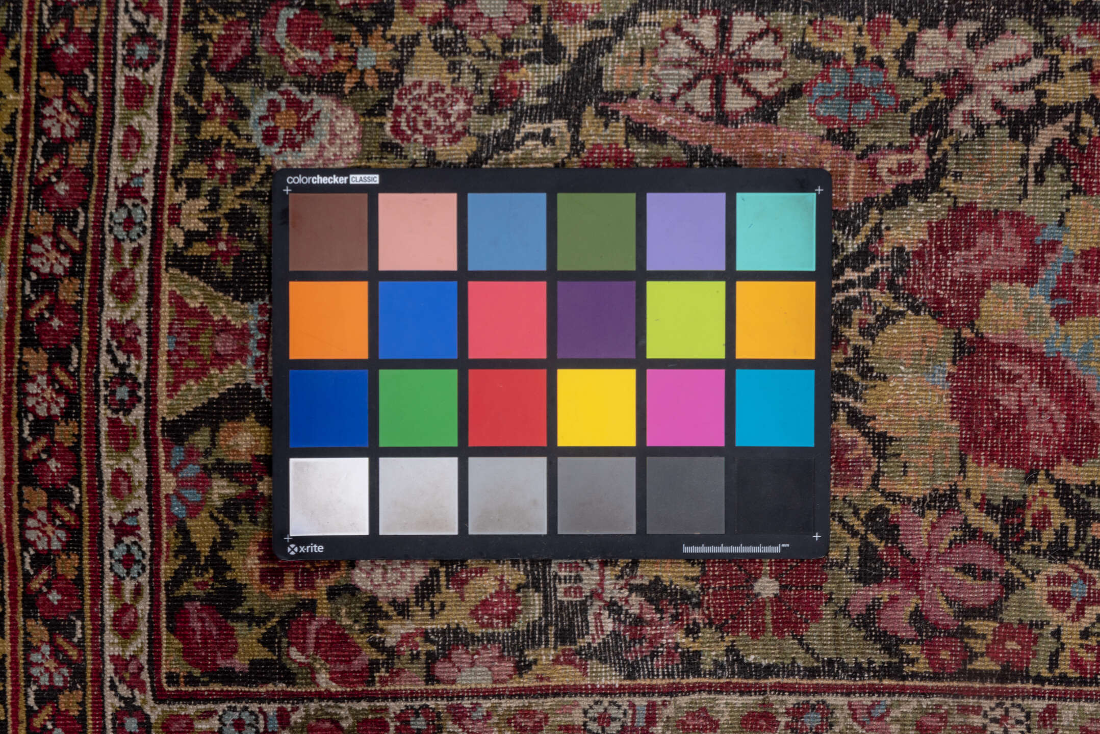 4' x 8' one-of-a-kind handmade vintage Agra rug. Color palette: brown, gray, pink, red