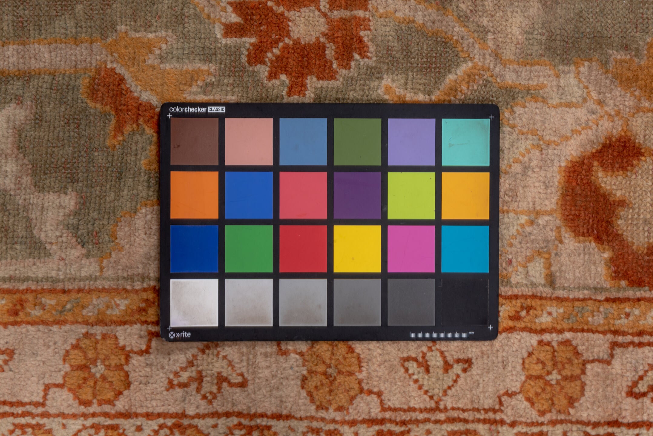 3' x 9' one-of-a-kind handmade vintage Oushak runner rug. Color palette: brown, off-white, pink, red, saddle brown, snow