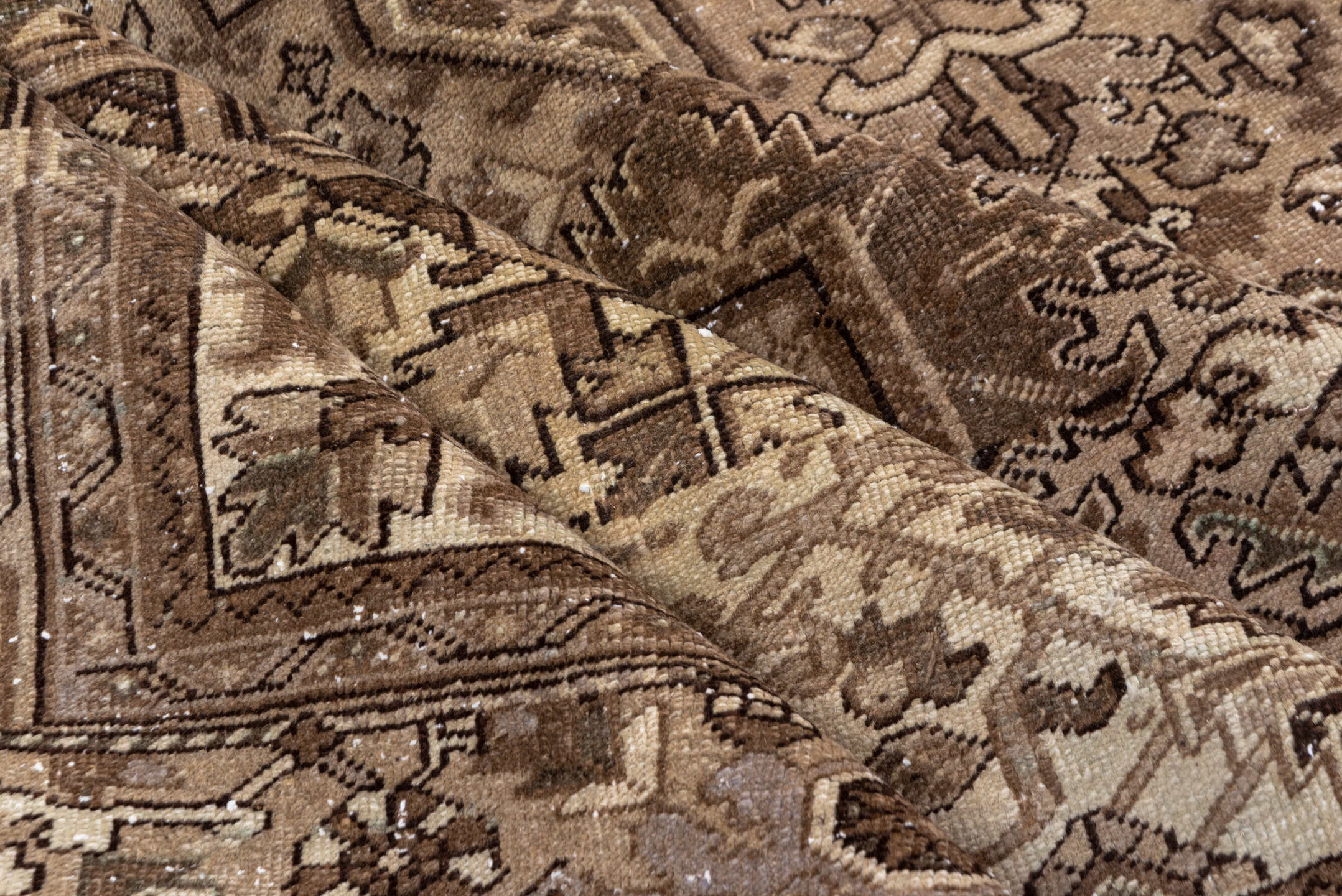 7' x 10' one-of-a-kind handmade antique Heriz large size rug. Color palette: taupe, camel, ivory, brown, beige, charcoal