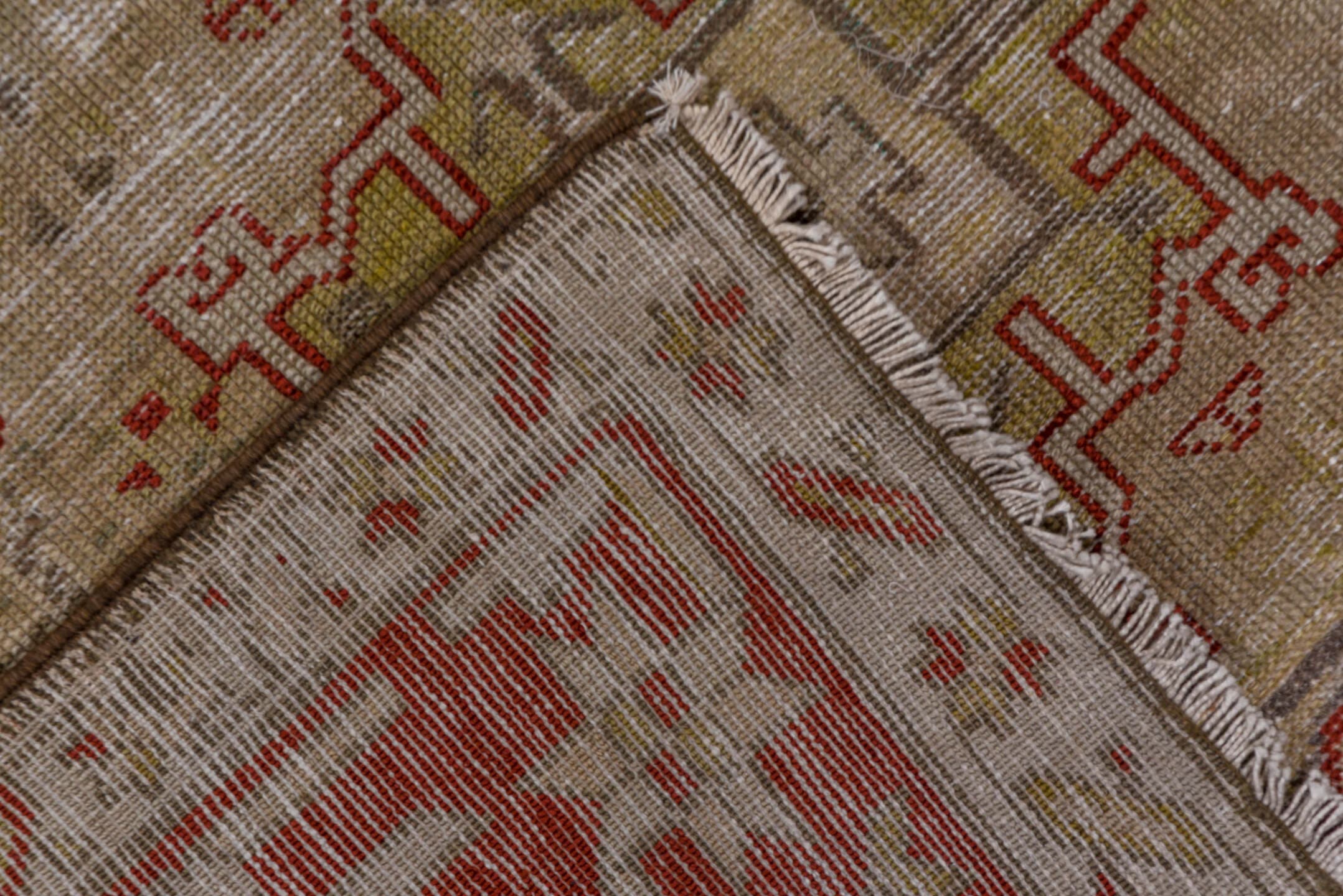 3' x 12' one-of-a-kind handmade antique Karaje runner rug. Color palette: ivory, rust, brick, taupe, camel, brown, rose