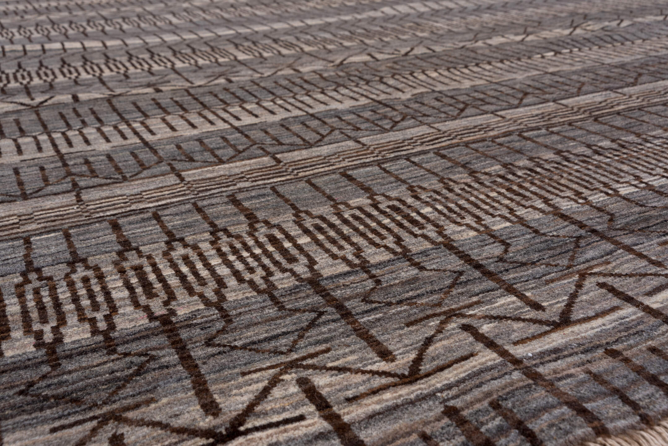 6' x 9' one-of-a-kind handmade vintage Gabbe medium size rug. Color palette: taupe, charcoal, ivory, brown, gray, beige