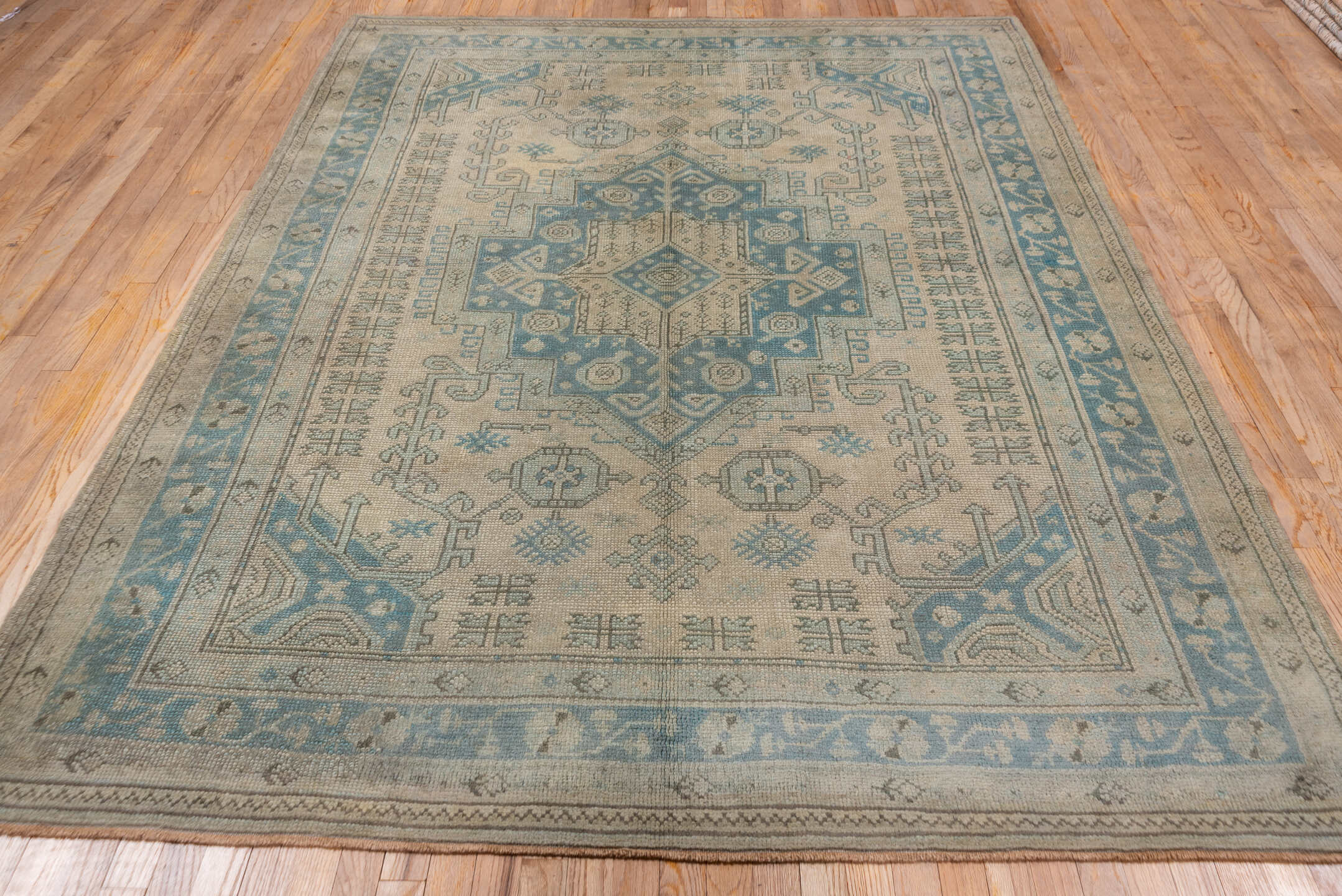 6' x 9' one-of-a-kind handmade antique Oushak medium size rug. Color palette: ivory, powder_blue, sky_blue, taupe, beige