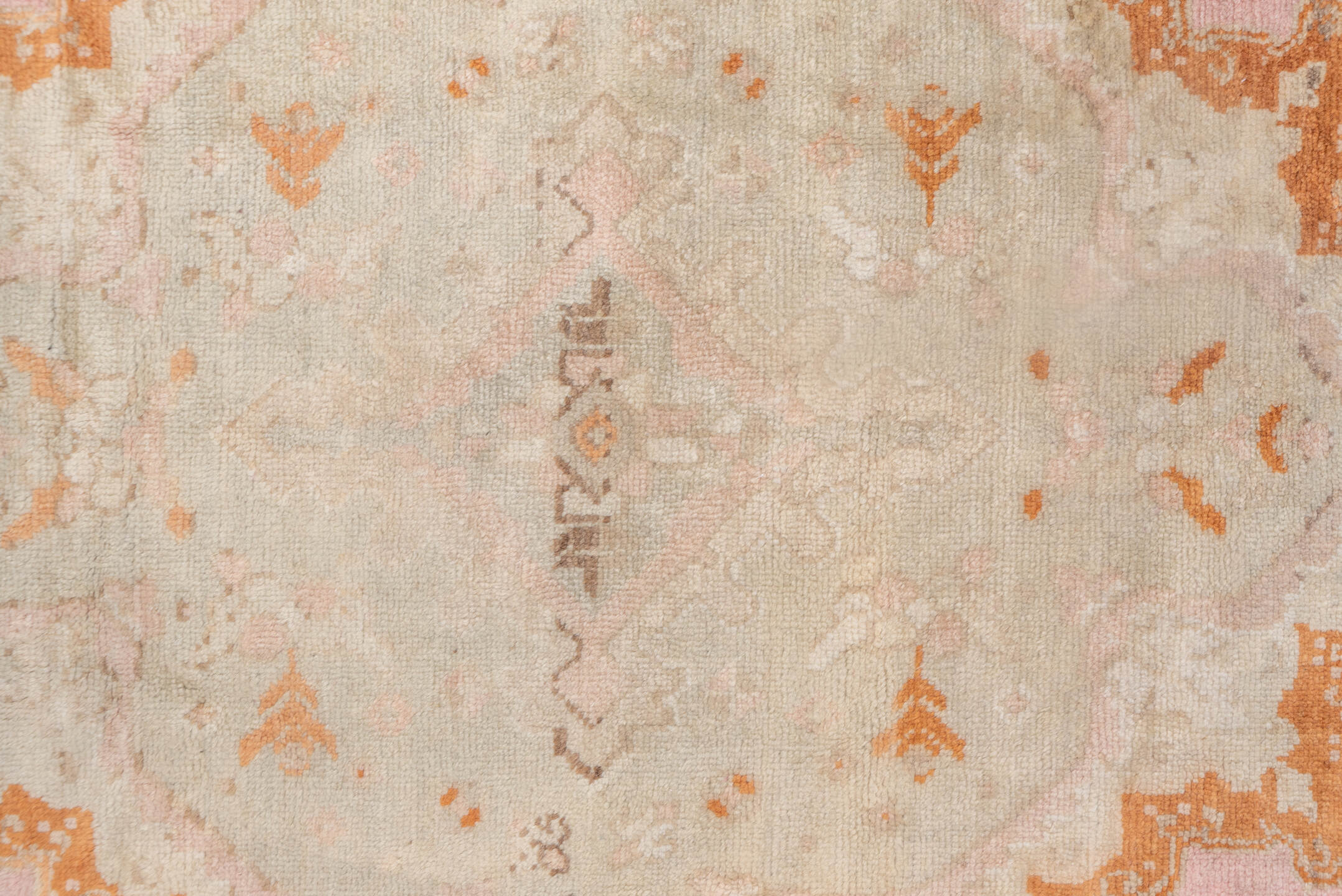10' x 21' one-of-a-kind handmade antique Oushak rug. Color palette: ivory, blush, peach, taupe, camel, sage, pink