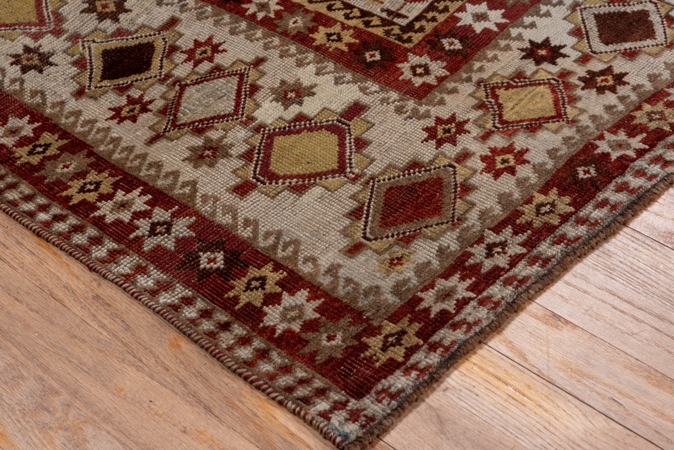 7' x 10' one-of-a-kind handmade antique Shiraz large size rug. Color palette: rust, ivory, taupe, brown, terracotta, camel
