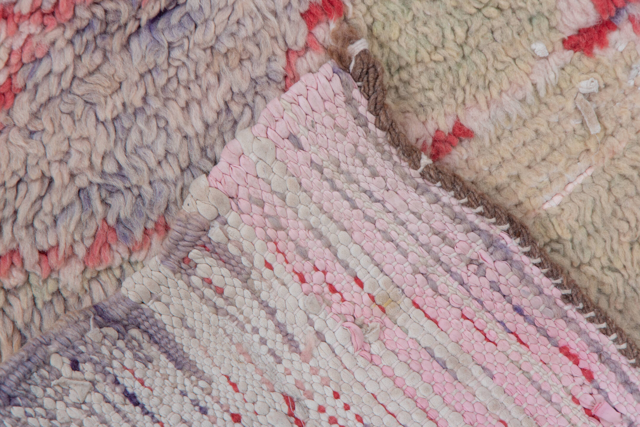 3' x 9' one-of-a-kind handmade vintage Rag Rug runner rug. Color palette: brown, gray, light gray, pink, red