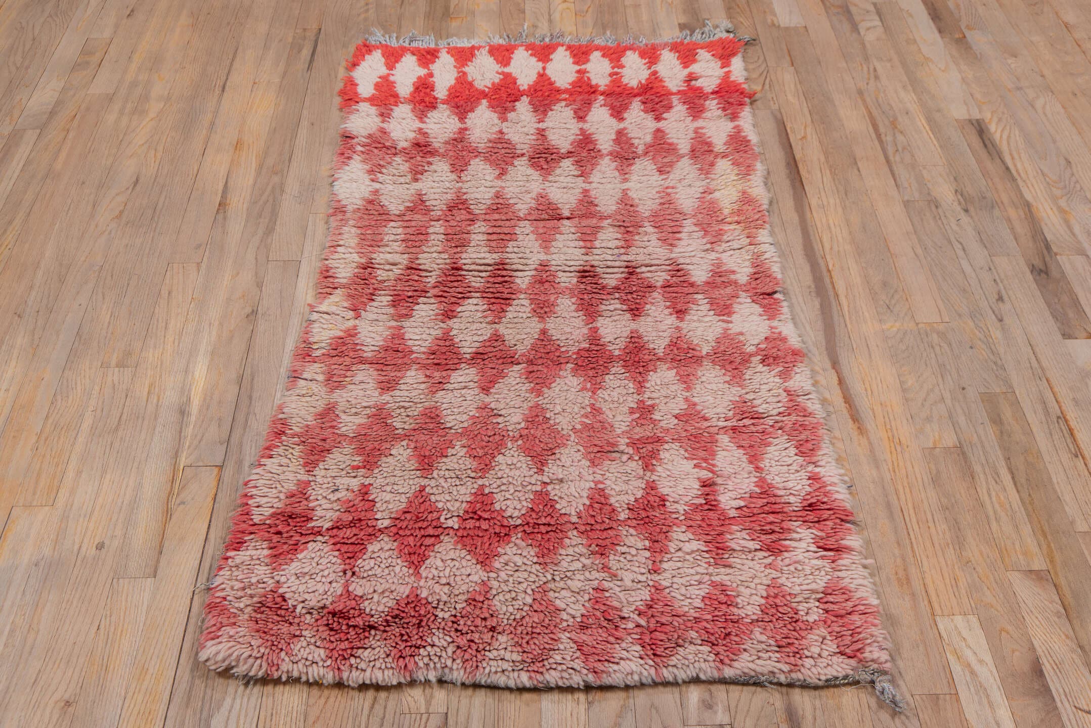 2' x 5' one-of-a-kind handmade vintage Moroccan small size rug. Color palette: rose, ivory, coral, blush, taupe, pink, red