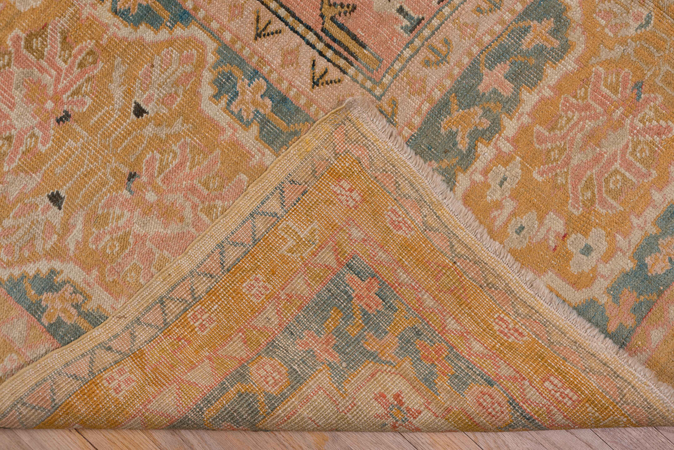 11' x 18' one-of-a-kind handmade antique Oushak oversize rug. Color palette: ivory, apricot, gold, sage, terra cotta, taupe