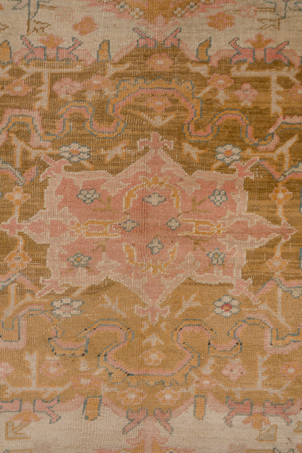 11' x 18' one-of-a-kind handmade antique Oushak oversize rug. Color palette: ivory, apricot, gold, sage, terra cotta, taupe