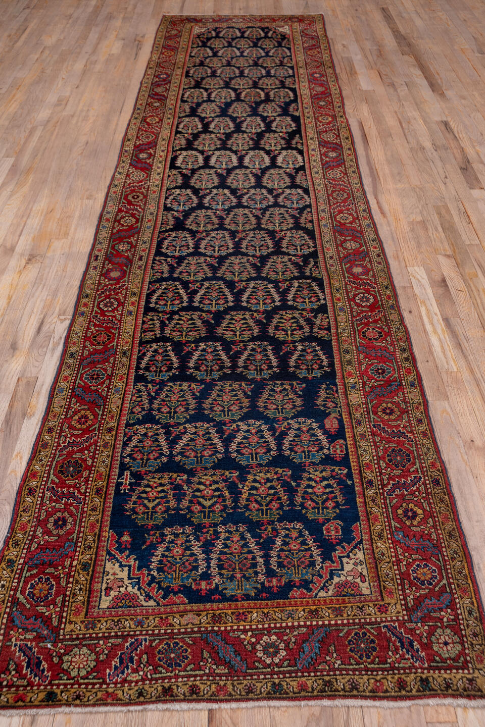 3' x 15' one-of-a-kind handmade antique NW Persian runner rug. Color palette: navy, rust, ivory, camel, indigo, burgundy
