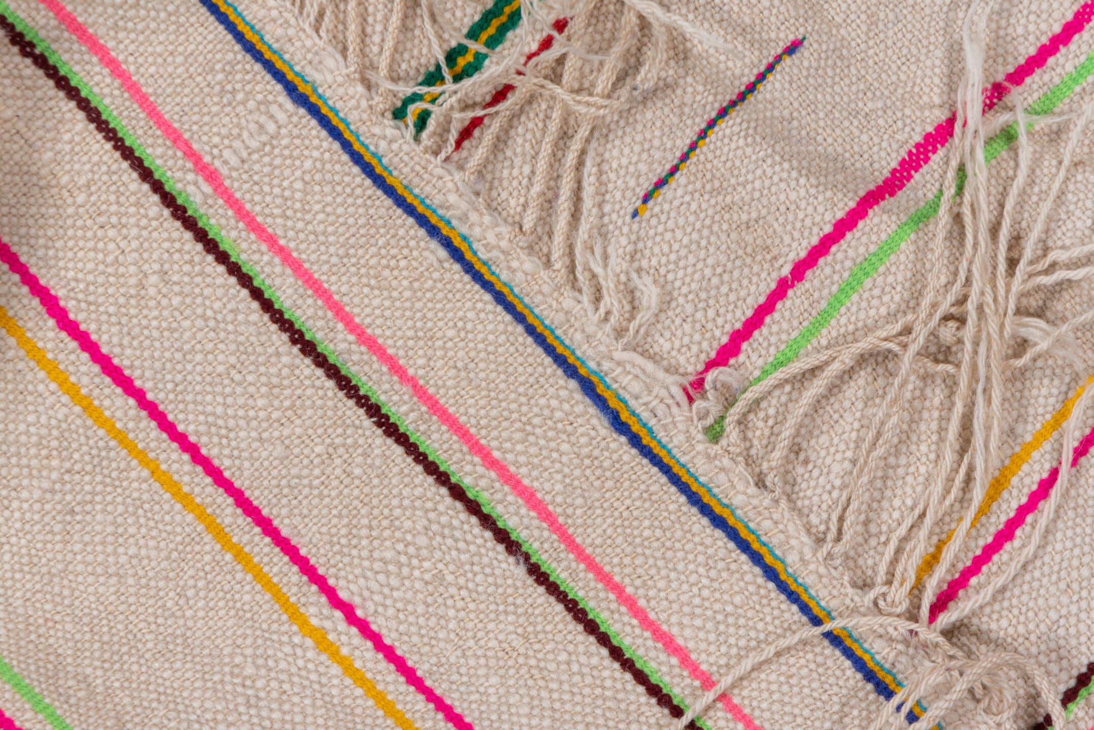 4' x 10' one-of-a-kind handmade vintage Textile runner rug. Color palette: ivory, pink, orange, gold, green, blue, taupe
