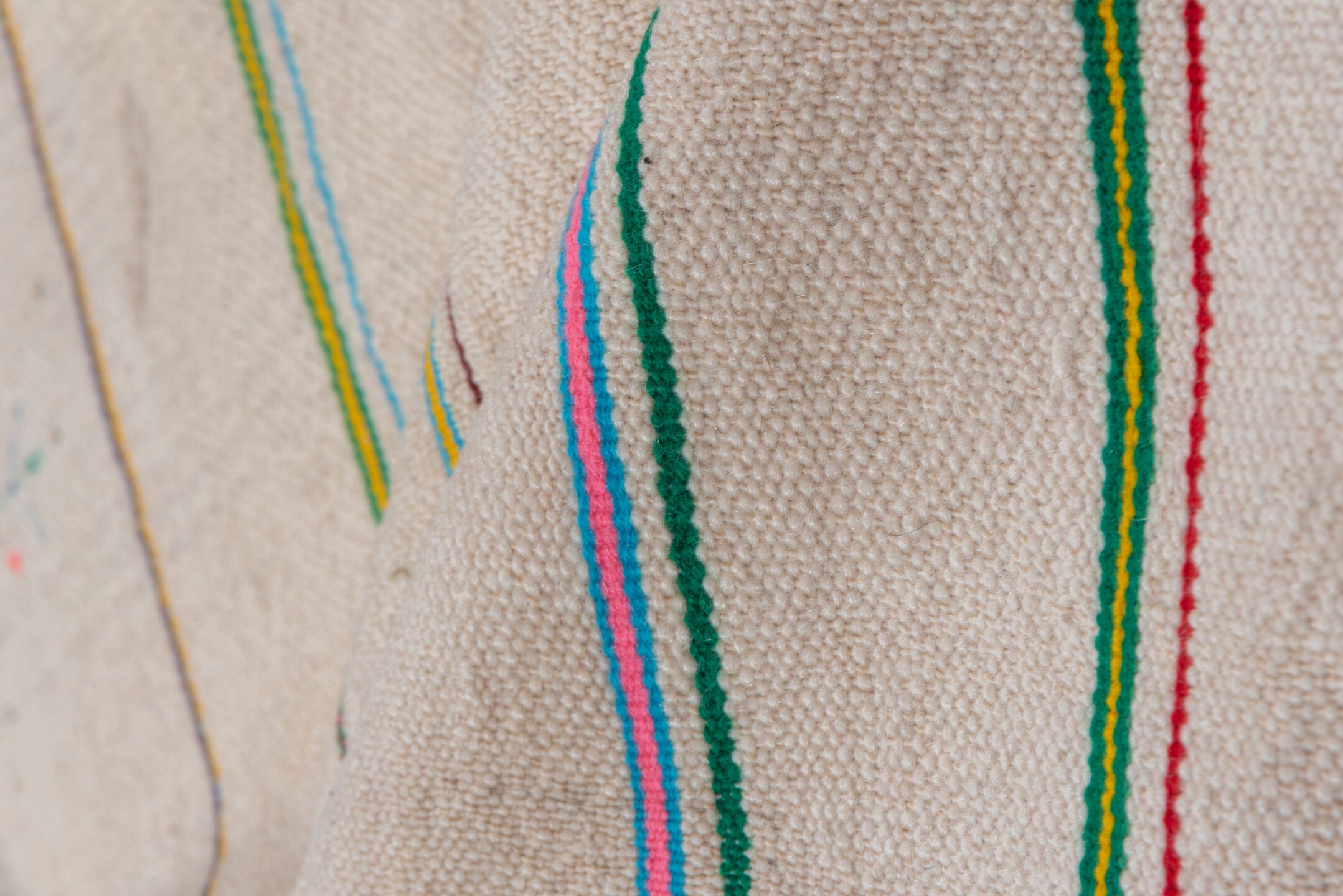 4' x 10' one-of-a-kind handmade vintage Textile runner rug. Color palette: ivory, pink, orange, gold, green, blue, taupe