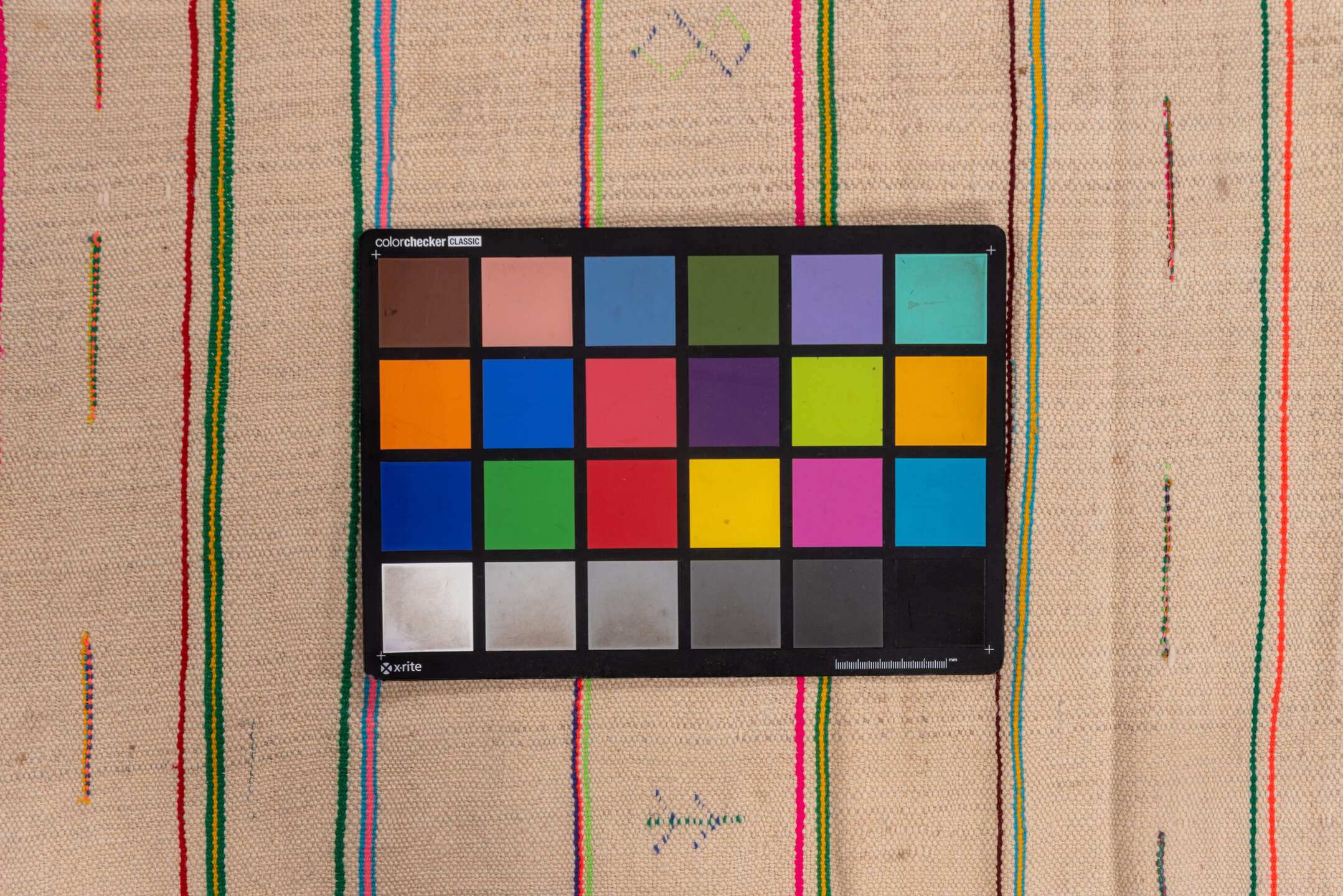 4' x 10' one-of-a-kind handmade vintage Textile runner rug. Color palette: ivory, pink, orange, gold, green, blue, taupe