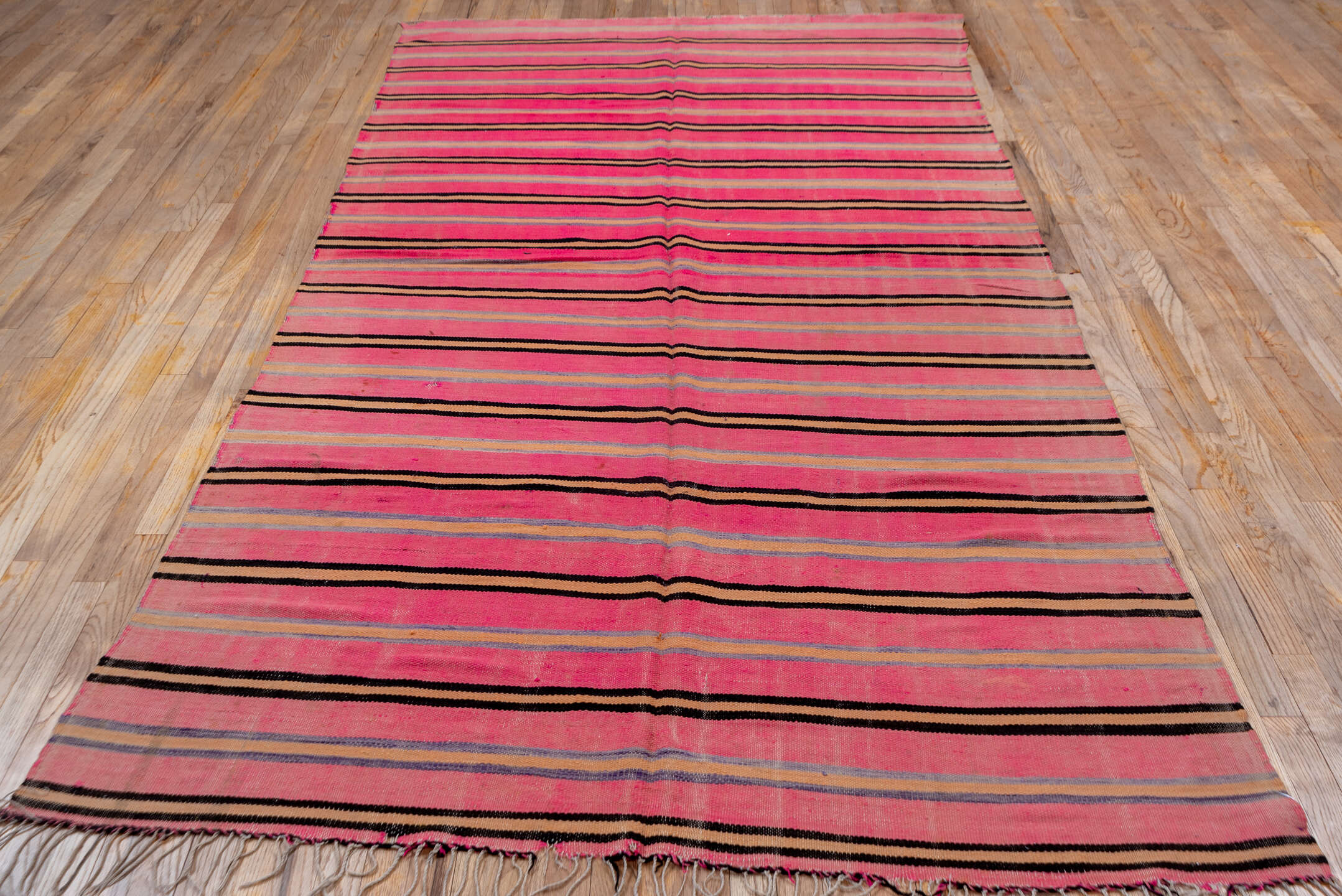 5' x 10' one-of-a-kind handmade vintage Blanket medium size rug. Color palette: pink, charcoal, taupe, muted blue, rose