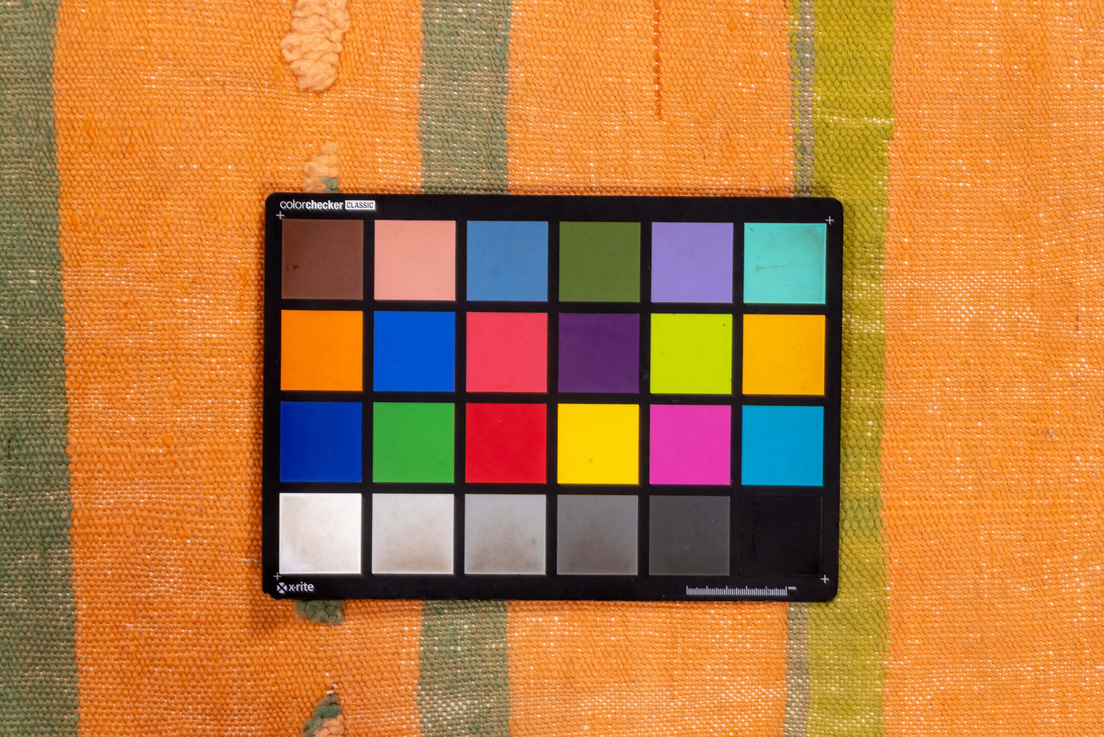 5' x 10' one-of-a-kind handmade vintage Blanket medium size rug. Color palette: brown, gray, light gray, off-white, orange