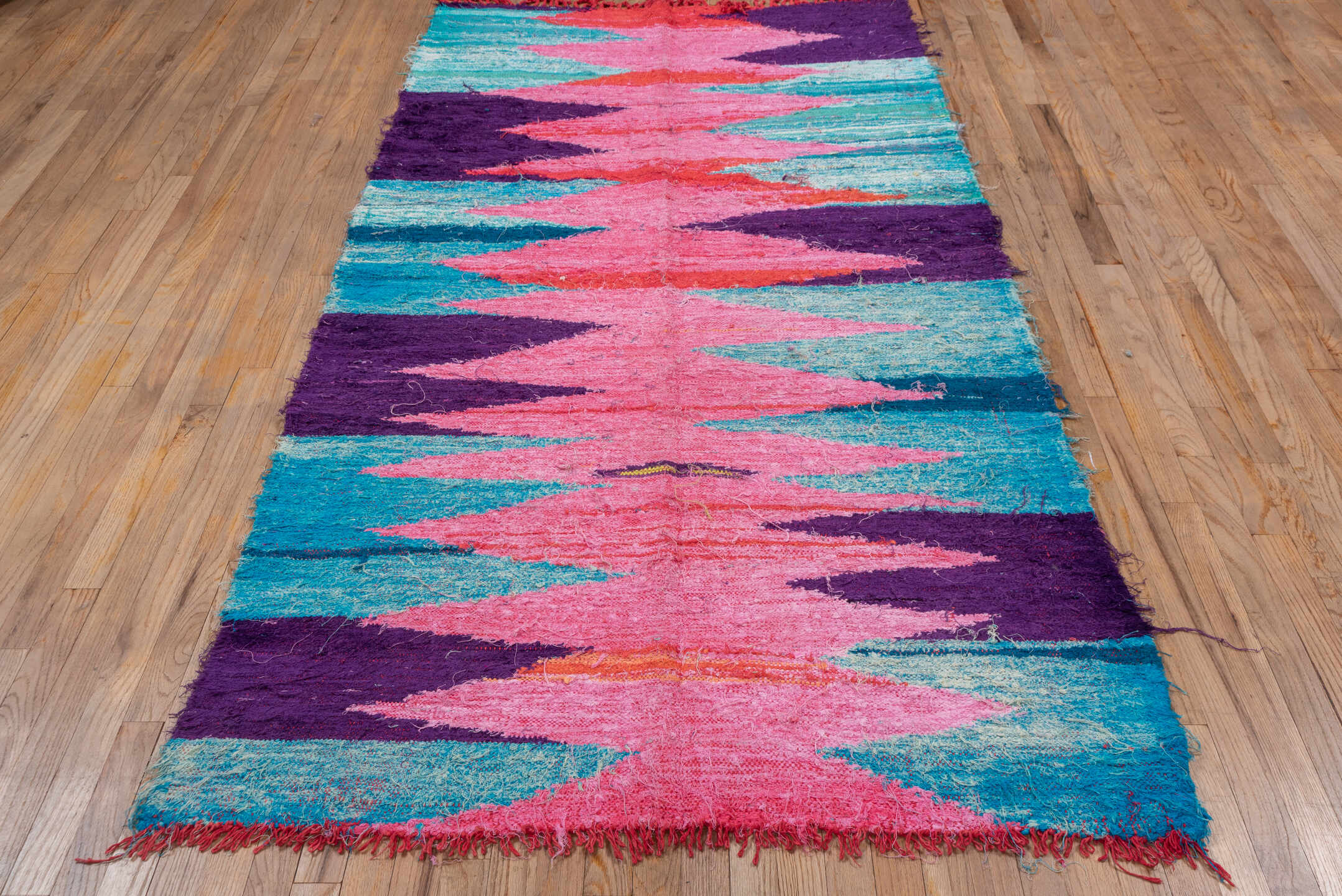 4' x 8' one-of-a-kind handmade vintage Flatweave runner rug. Color palette: pink, turquoise, purple, coral, aqua, teal