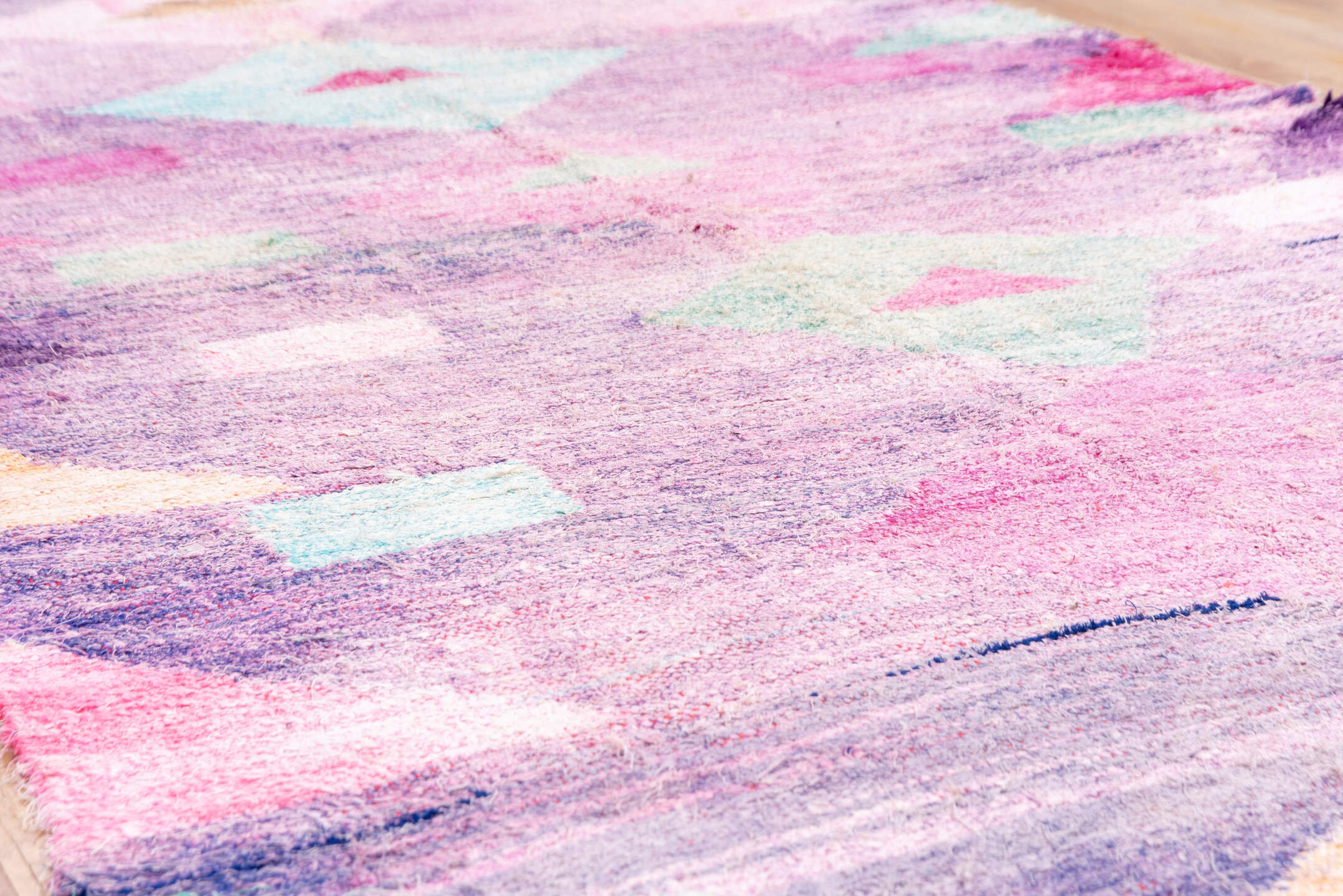 4' x 8' one-of-a-kind handmade vintage Rag Rug rug. Color palette: lavender, plum, pink, aqua, raspberry, mint, peach, ivory