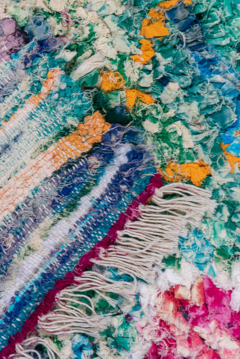 5' x 8' one-of-a-kind handmade vintage Rag Rug medium size rug. Color palette: turquoise, cobalt, fuchsia, violet, ivory