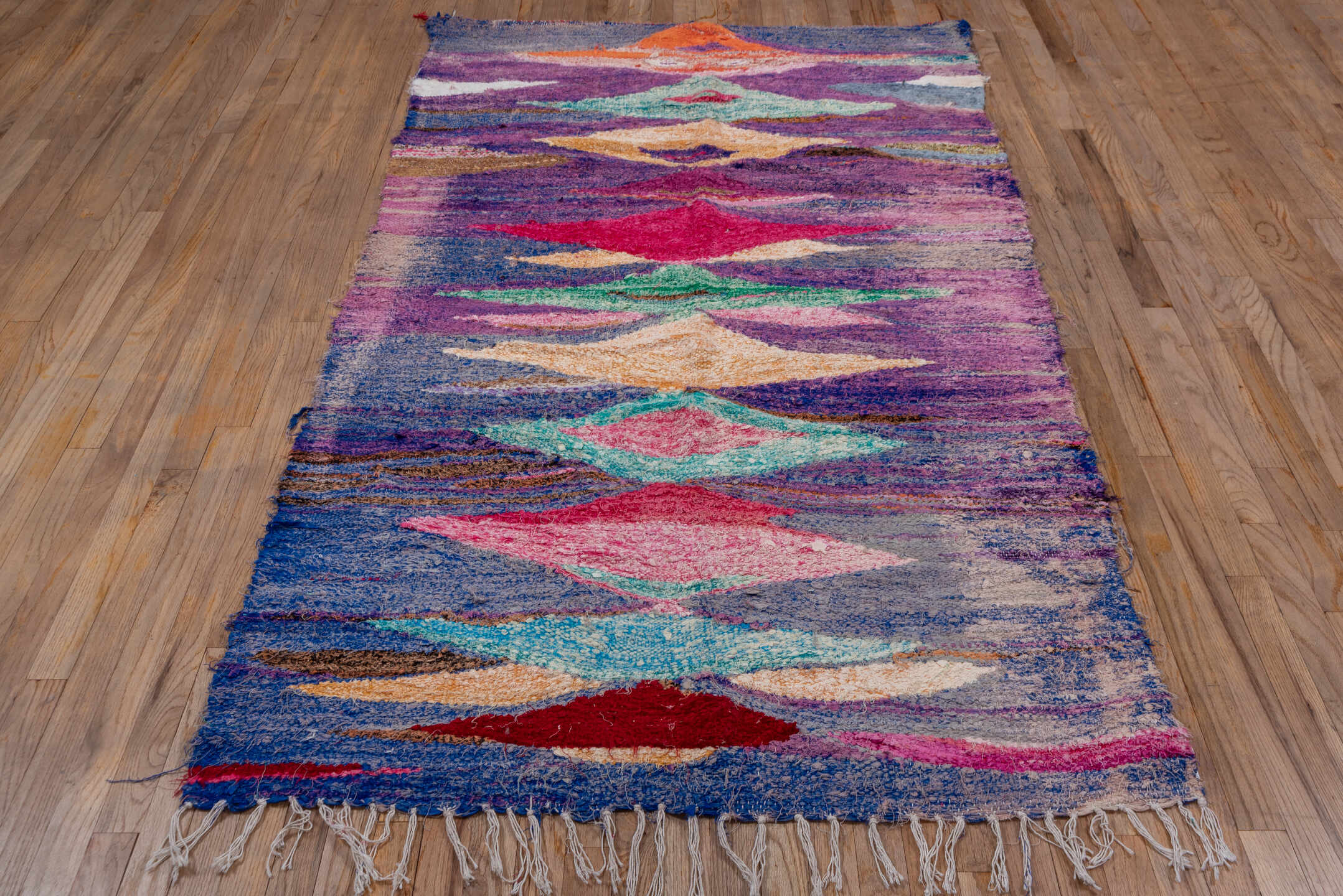 4' x 8' one-of-a-kind handmade vintage Flatweave rug. Color palette: violet, cobalt, magenta, aqua, blush, ivory, gray