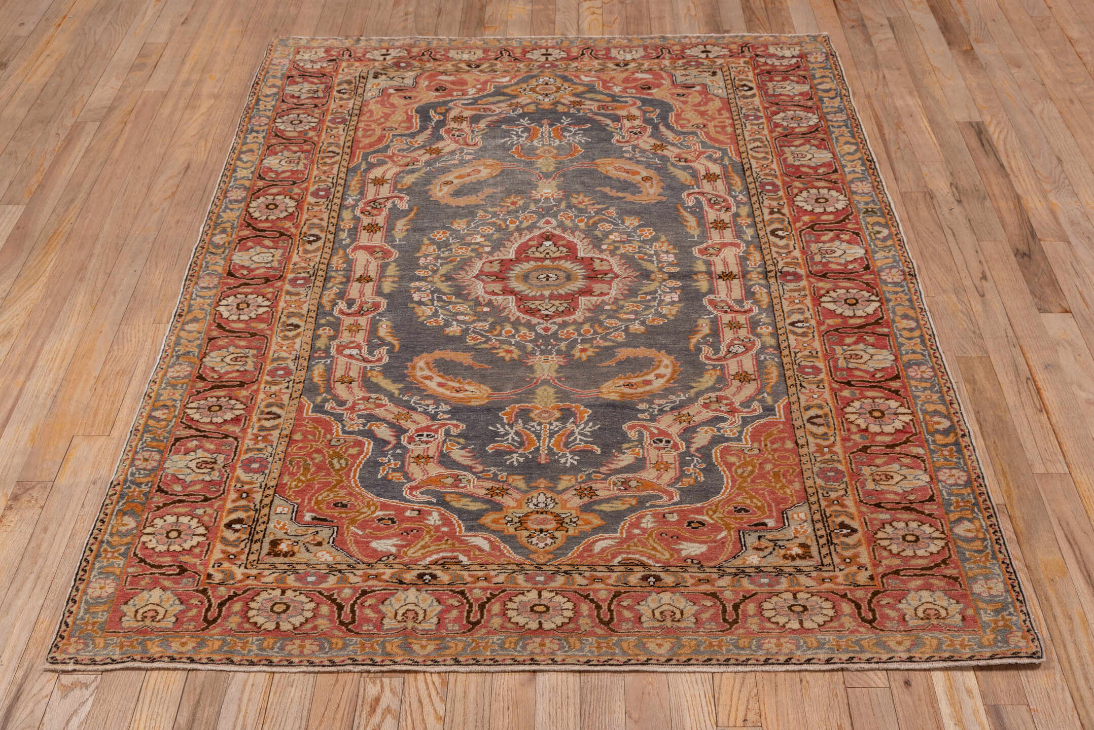 4' x 6' one-of-a-kind handmade antique Kaisary small size rug. Color palette: slate, coral, rust, ivory, gold, rose, camel