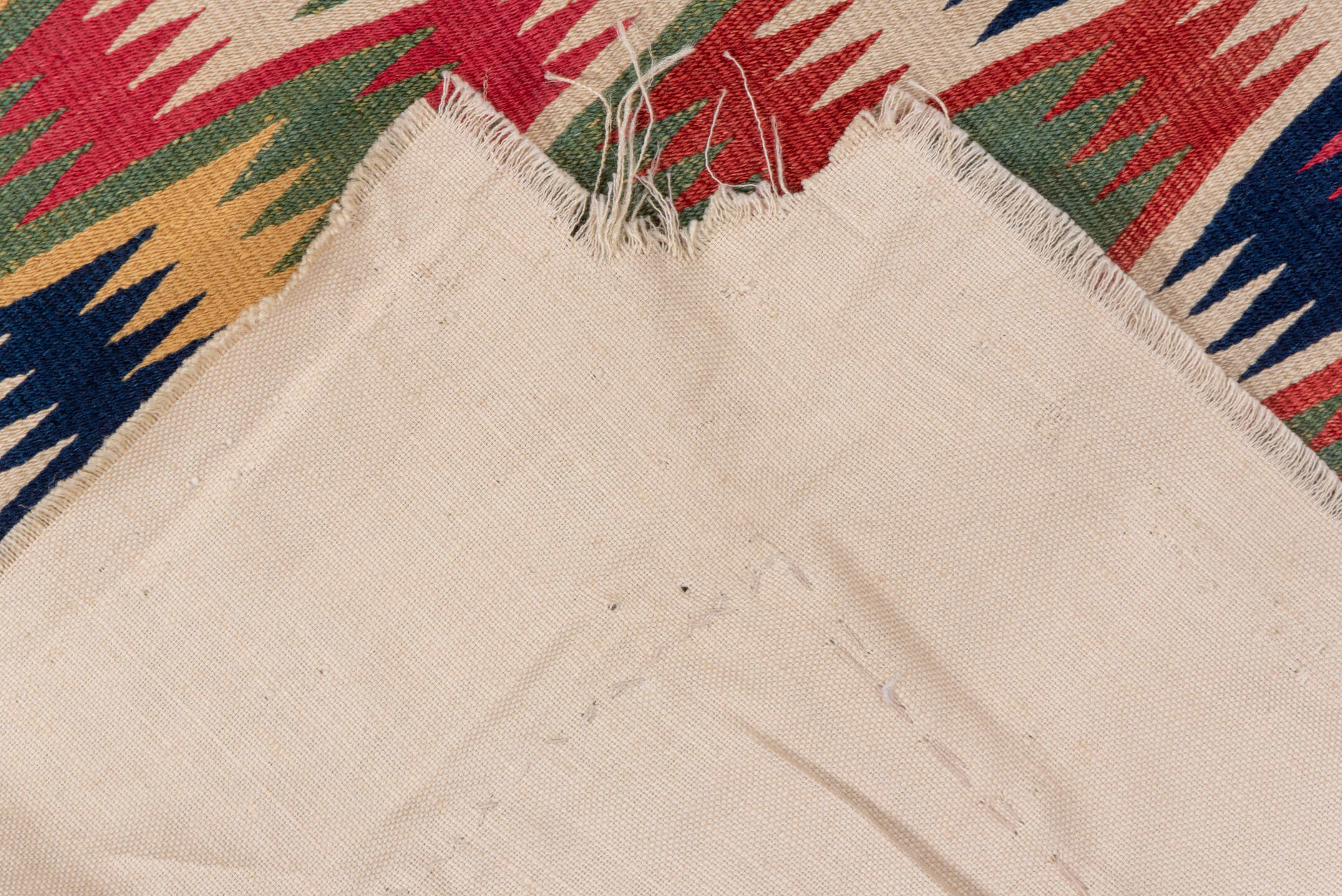 2' x 5' one-of-a-kind handmade vintage Rollaken small size rug. Color palette: blue, brown, gray, off-white, orange, pink