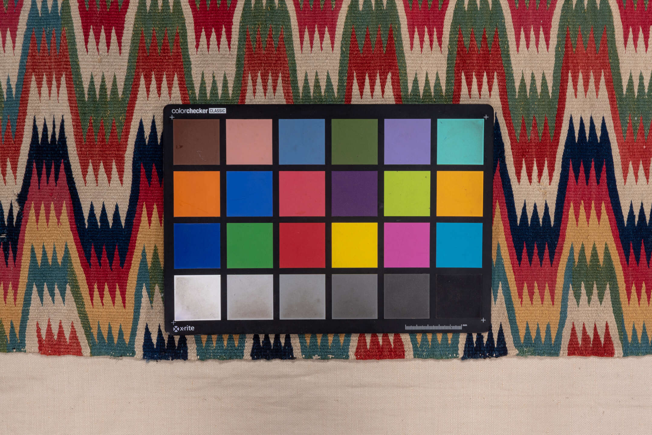 2' x 5' one-of-a-kind handmade vintage Rollaken small size rug. Color palette: blue, brown, gray, off-white, orange, pink