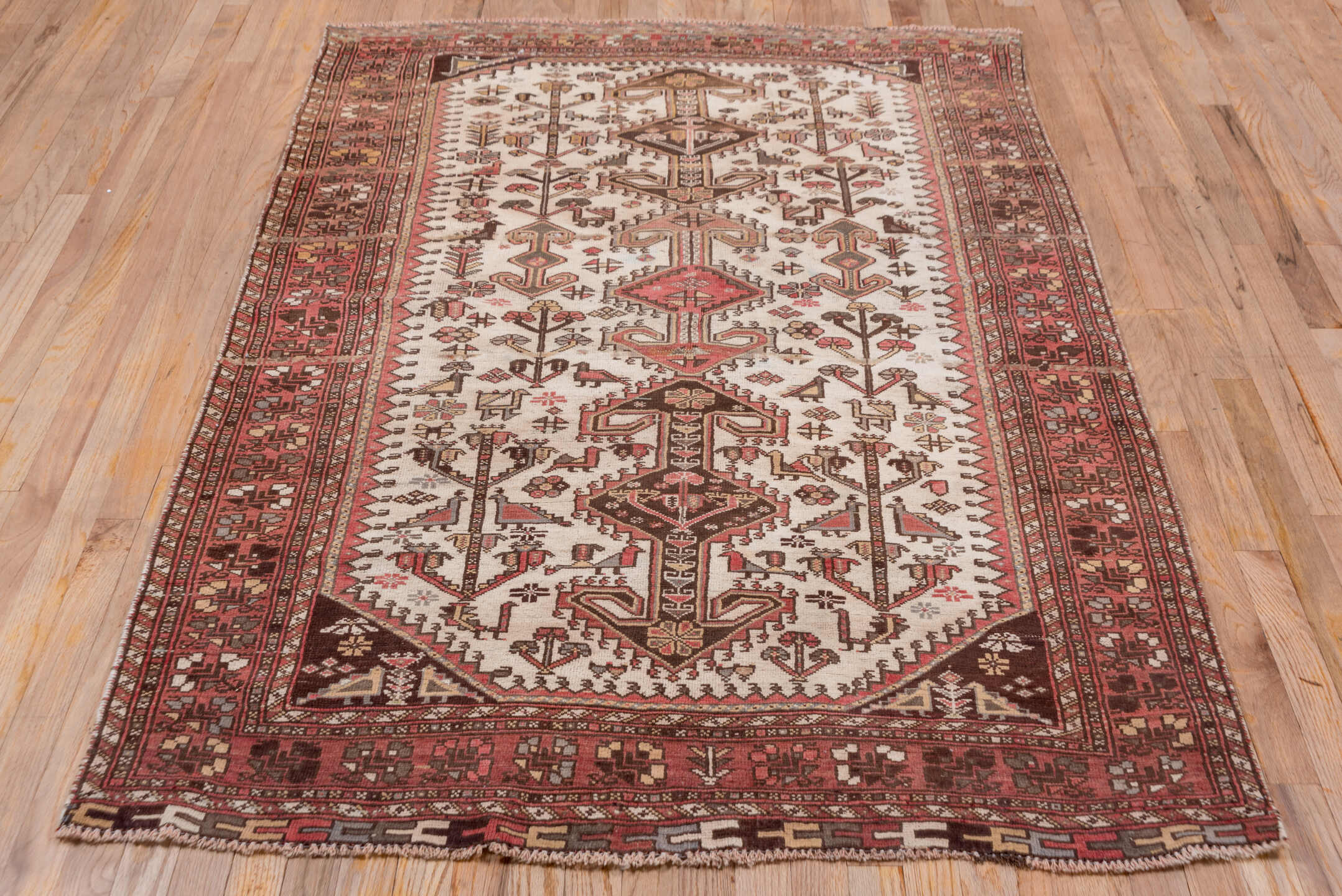 4' x 6' one-of-a-kind handmade vintage Afshar small size rug. Color palette: brown, gray, light gray, off-white, pink, red