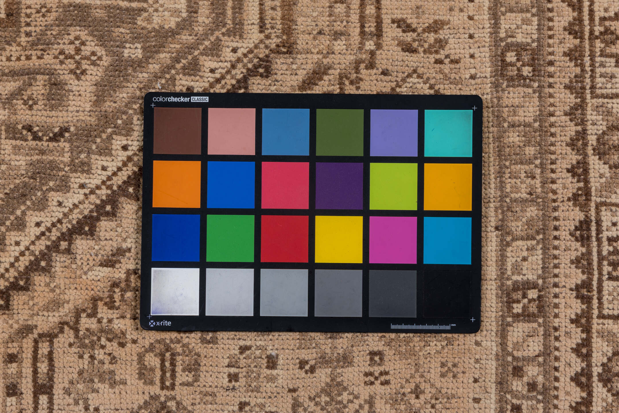 5' x 6' one-of-a-kind handmade vintage Shiraz rug. Color palette: brown, gray, light gray, off-white, pink, snow, tan, white