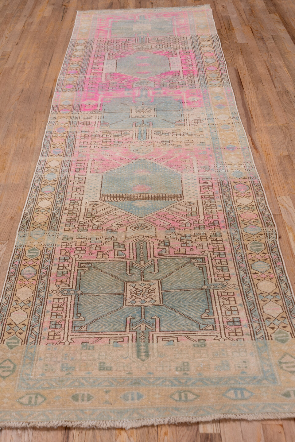 3' x 11' one-of-a-kind handmade antique Sarab runner rug. Color palette: ivory, sky blue, pink, camel, taupe, charcoal
