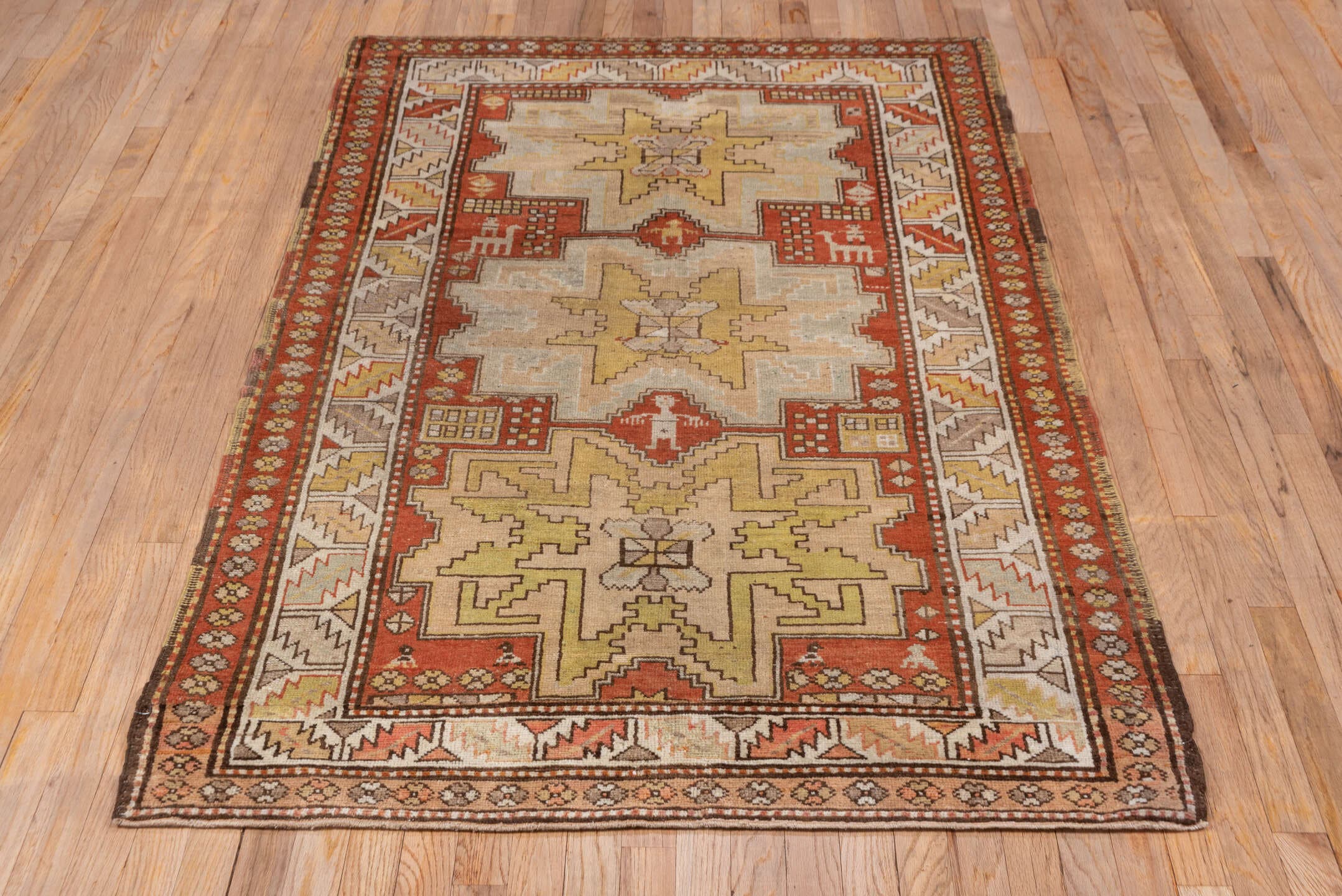 3' x 6' one-of-a-kind handmade antique Caucasian small size rug. Color palette: ivory, rust, taupe, gold, brown, camel